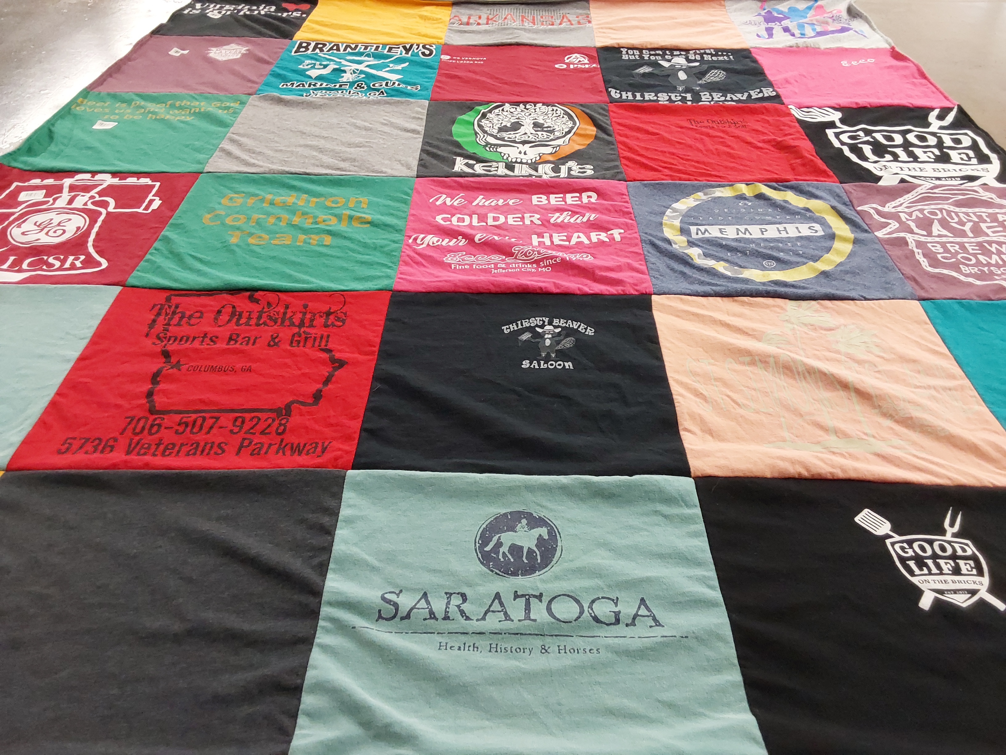 T-shirt quilt with sports, bars themes by Diane from SC