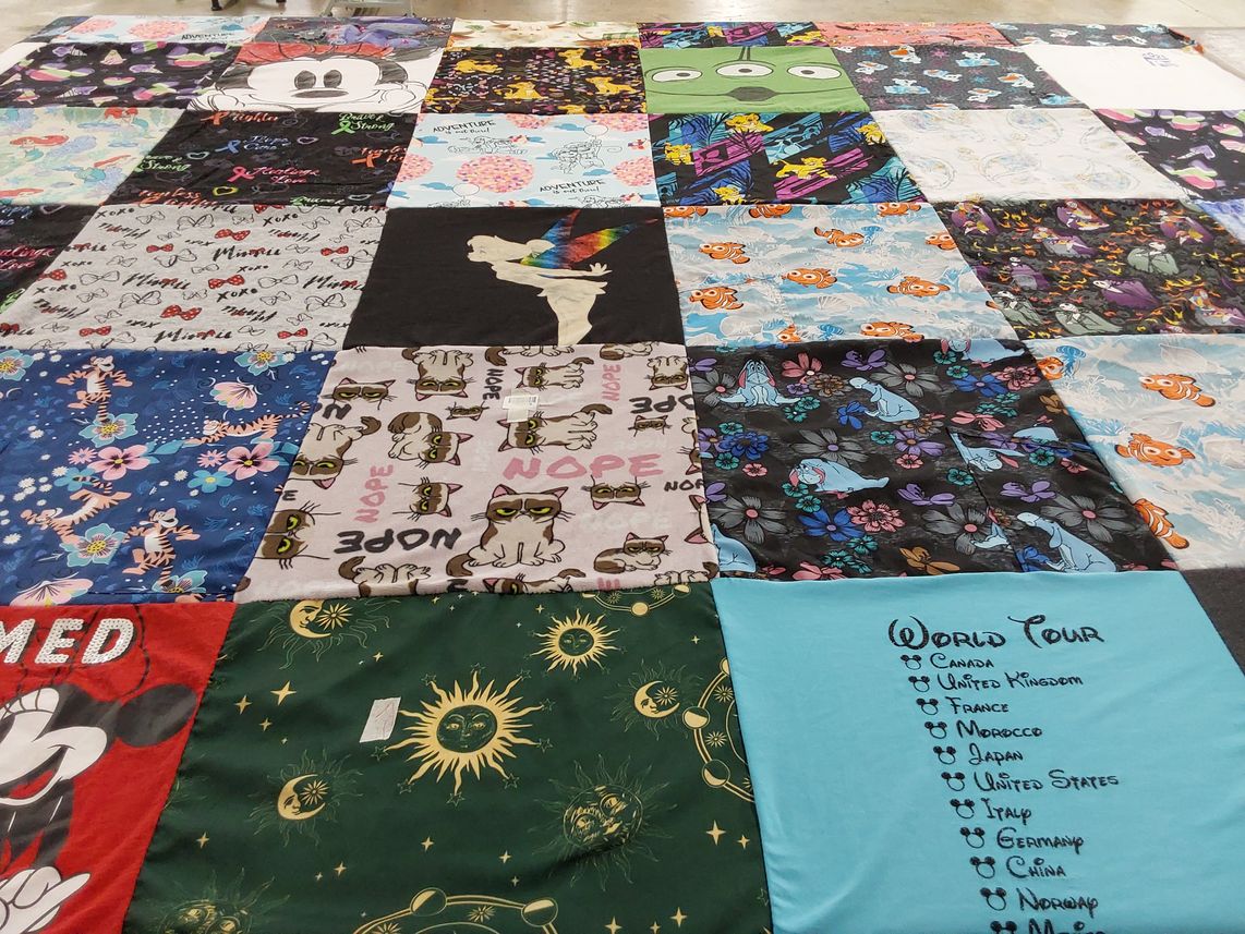 T-shirt quilt with disney, travel themes by Tiffany from NH