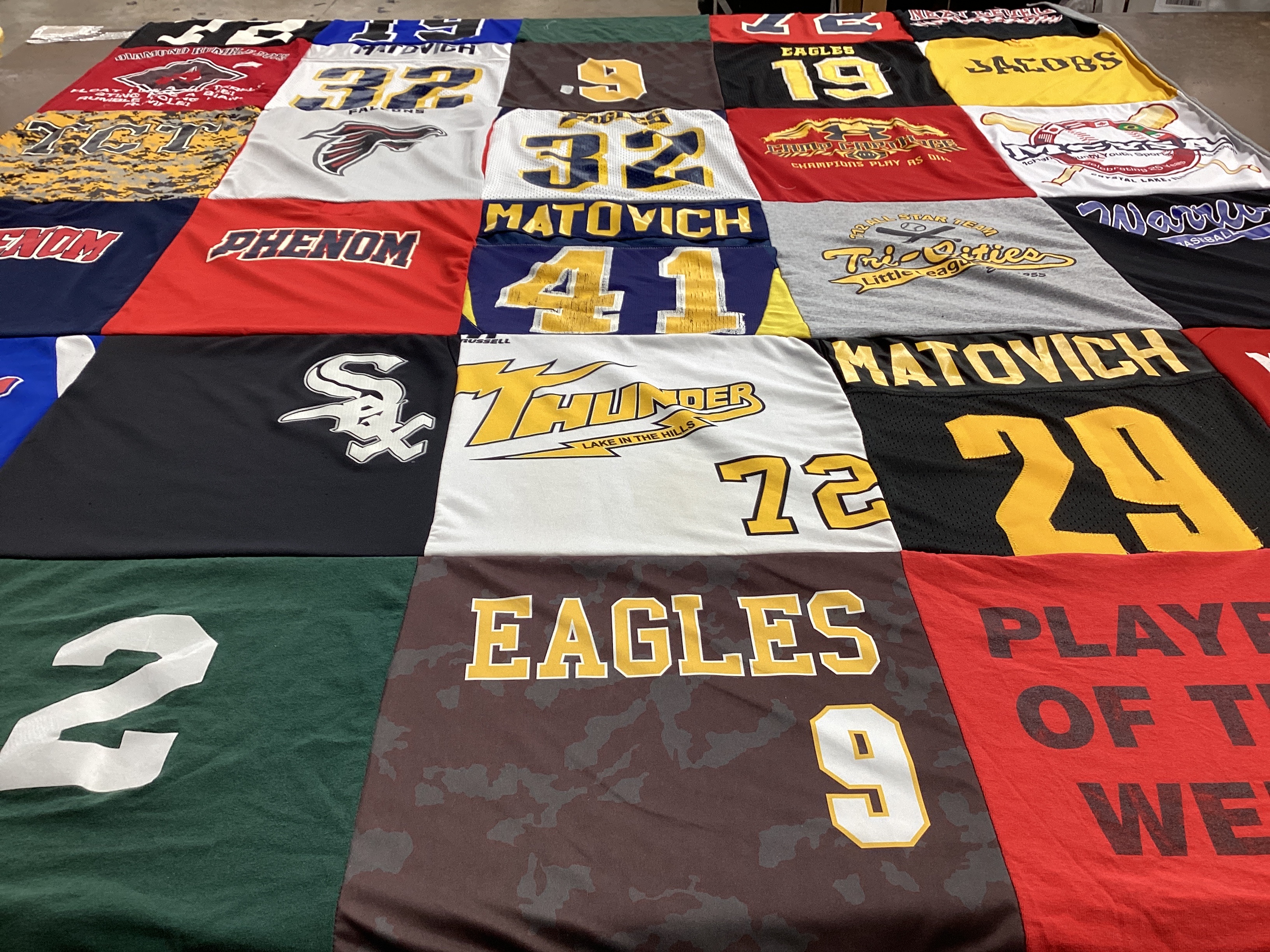 T-shirt quilt with sports, youth sports themes by Jodi from IL
