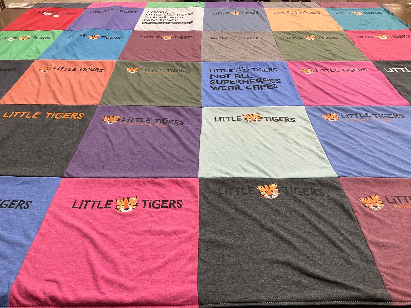 T-shirt quilt with education, children themes by Anika from IA