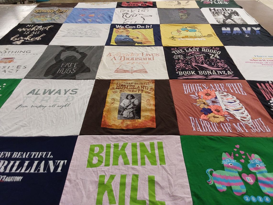 T-shirt quilt with reading, books themes by Junita from OR