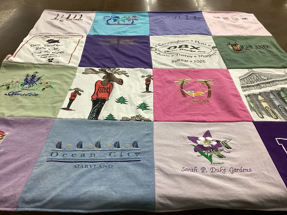 T-shirt quilt with outdoor activities, travel themes by Lesley from TX