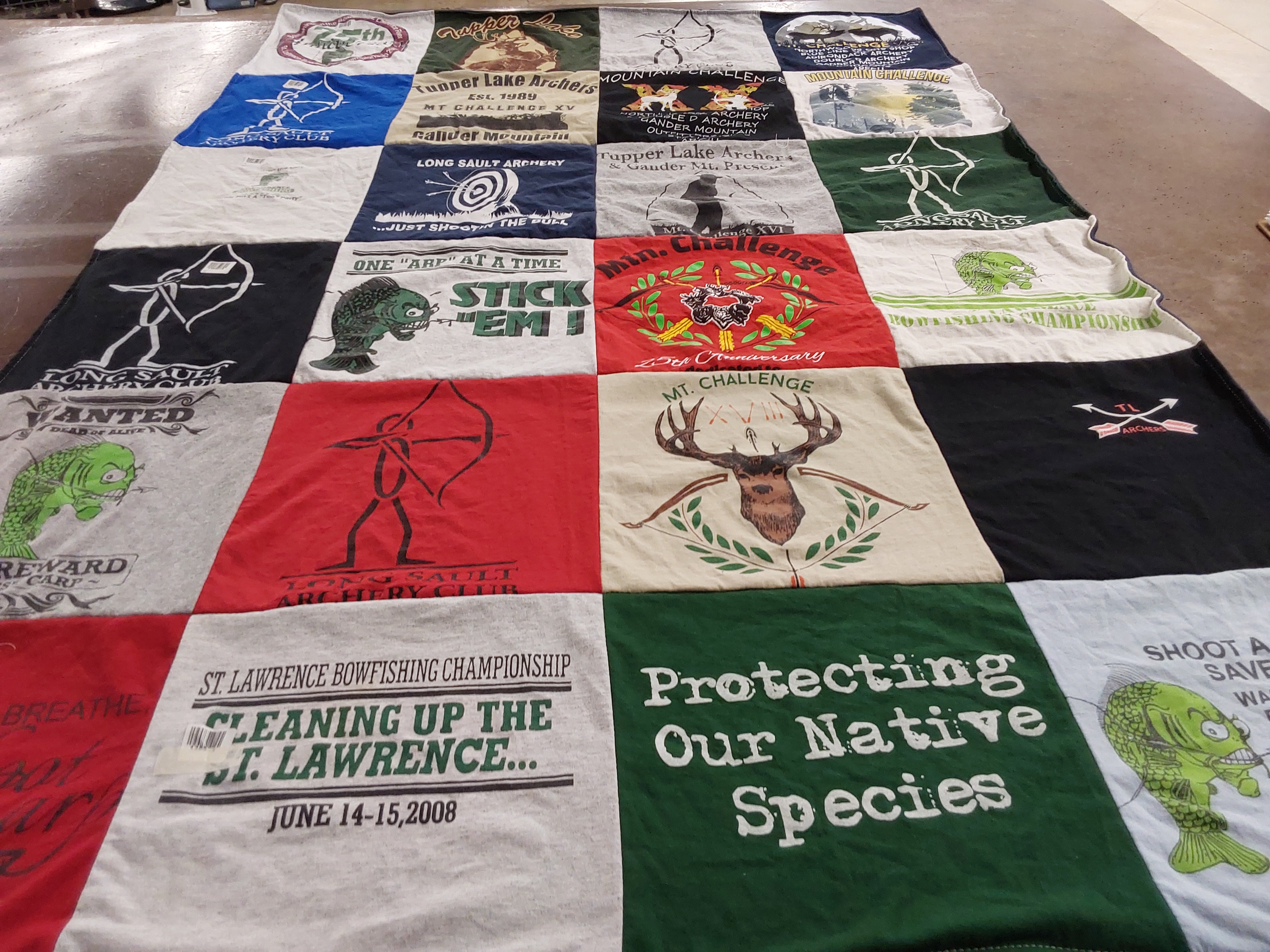 T-shirt quilt with archery, bowfishing themes by Sharon from NY