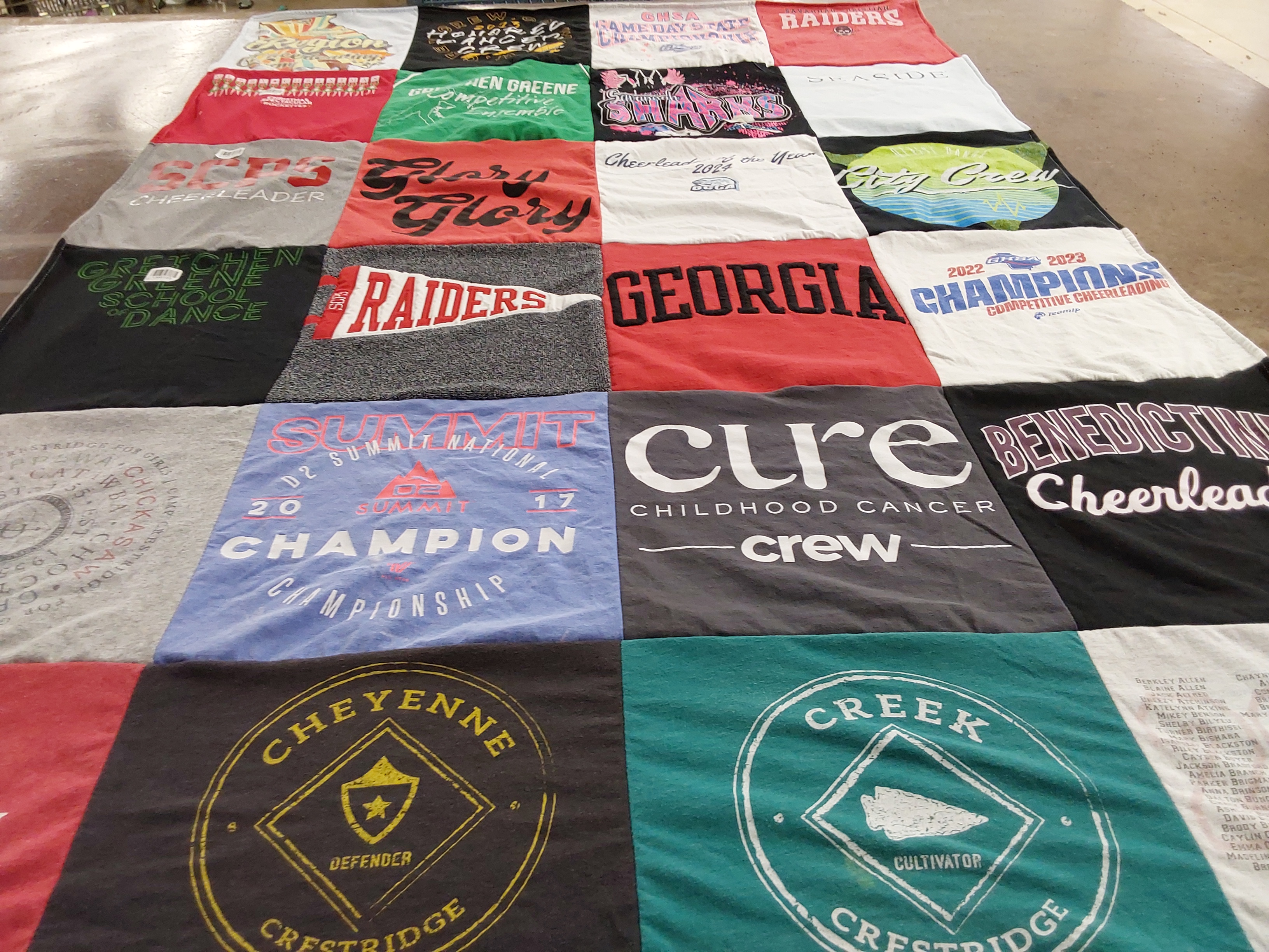 T-shirt quilt featuring summit cheerleading team, raiders by JENNY from GA