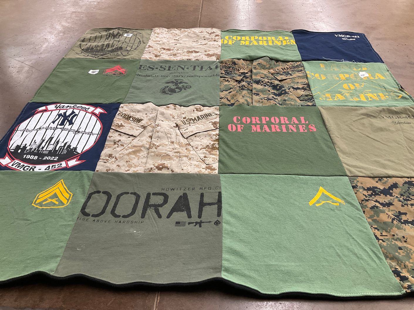 T-shirt quilt with military, sports themes by Emma from MO