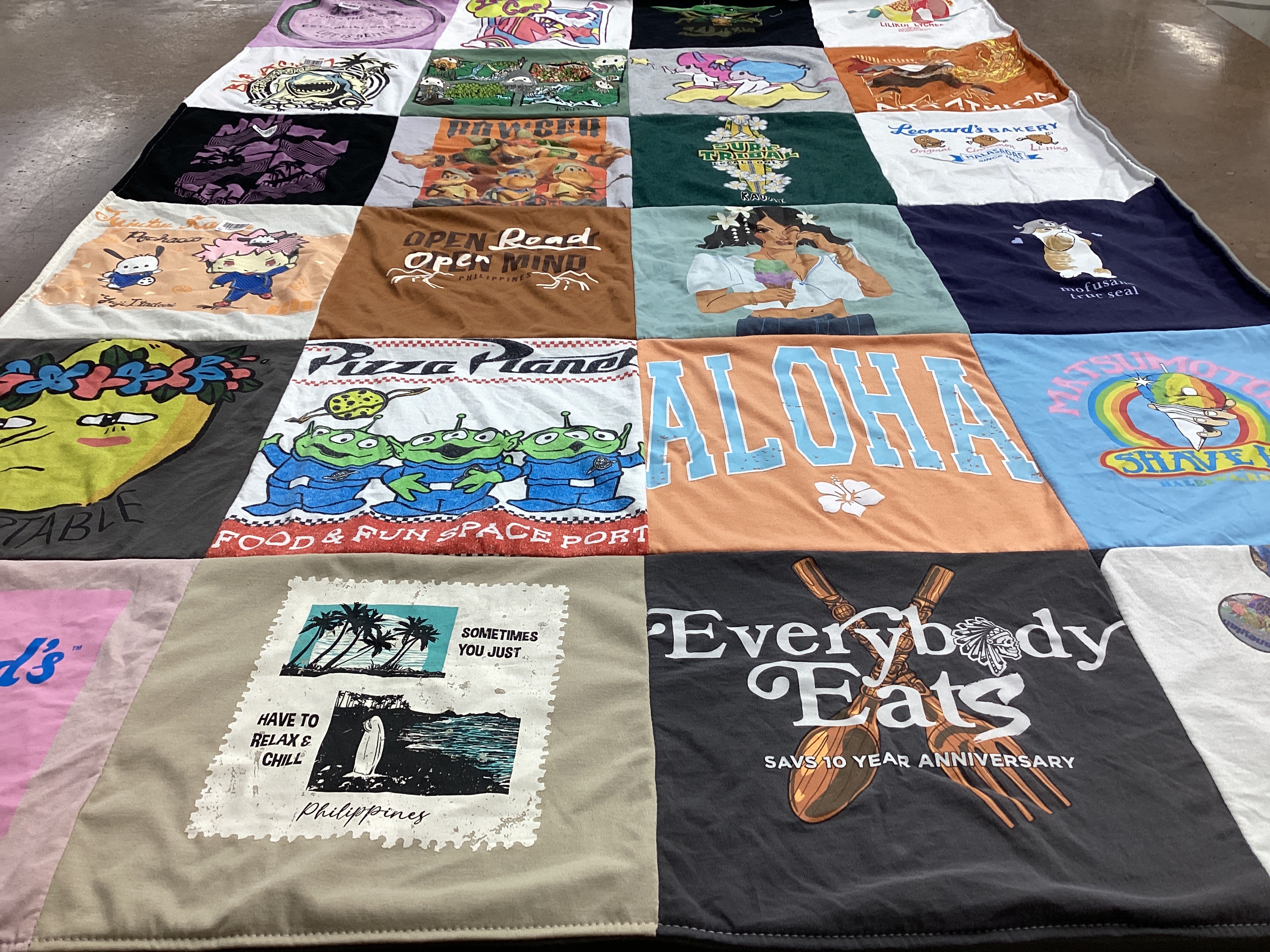 T-shirt quilt with food, beaches themes by Lauren from CA