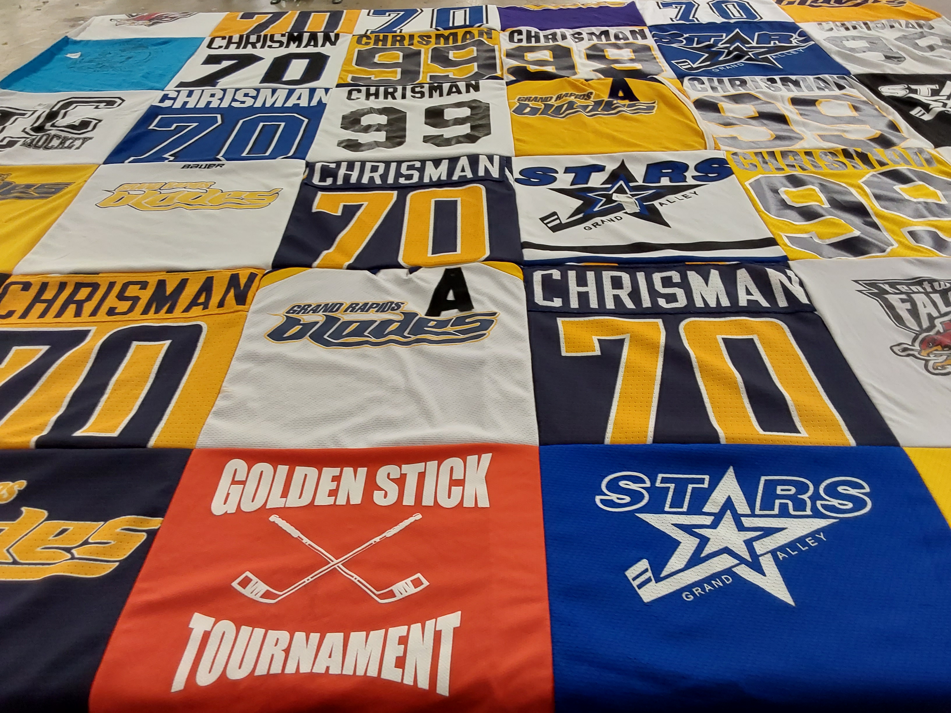T-shirt quilt featuring grand rapids blades, grand alley stars by Theresa from MI