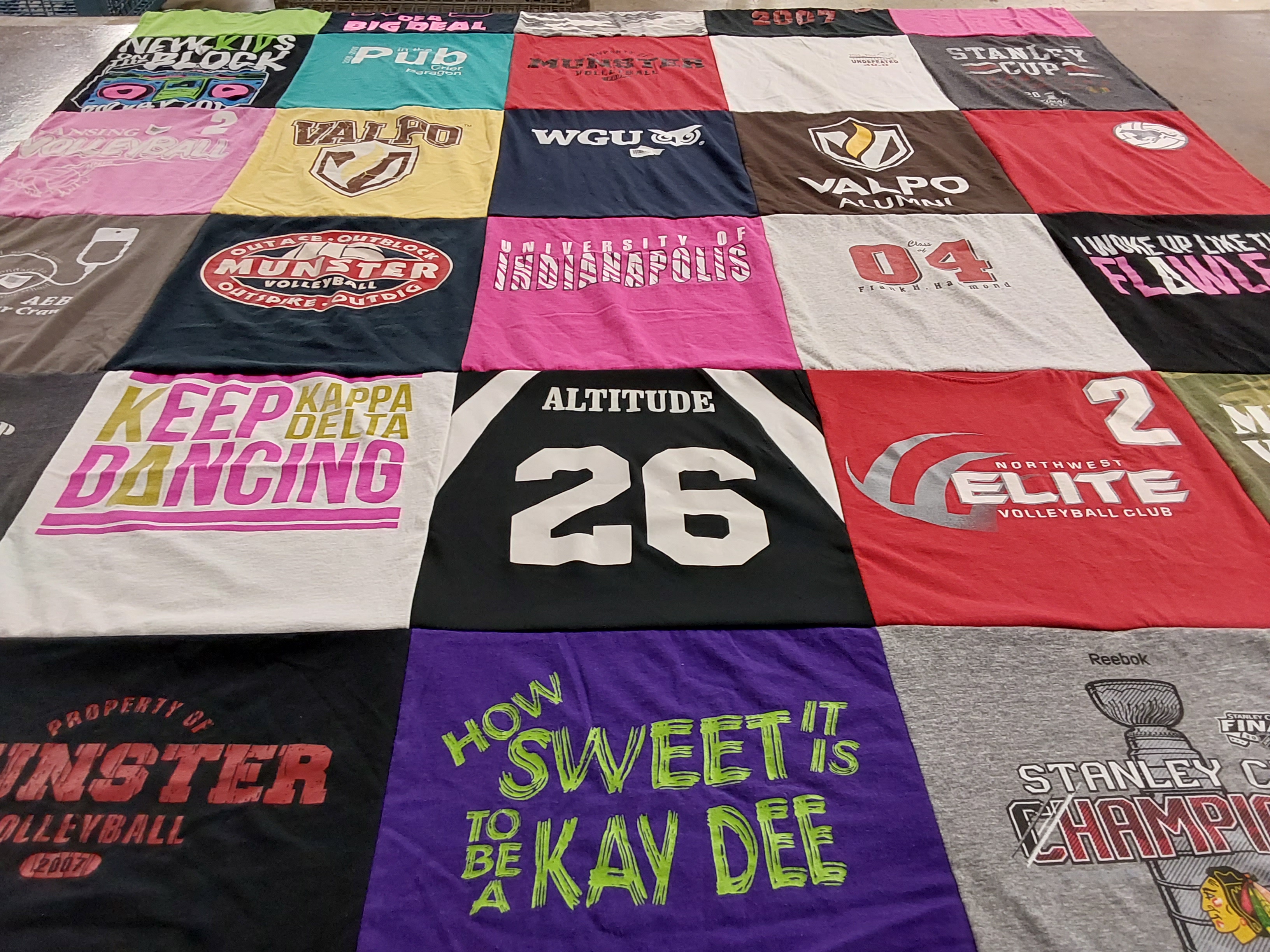 T-shirt quilt featuring northwest elite volleyball club by Kristi from IN
