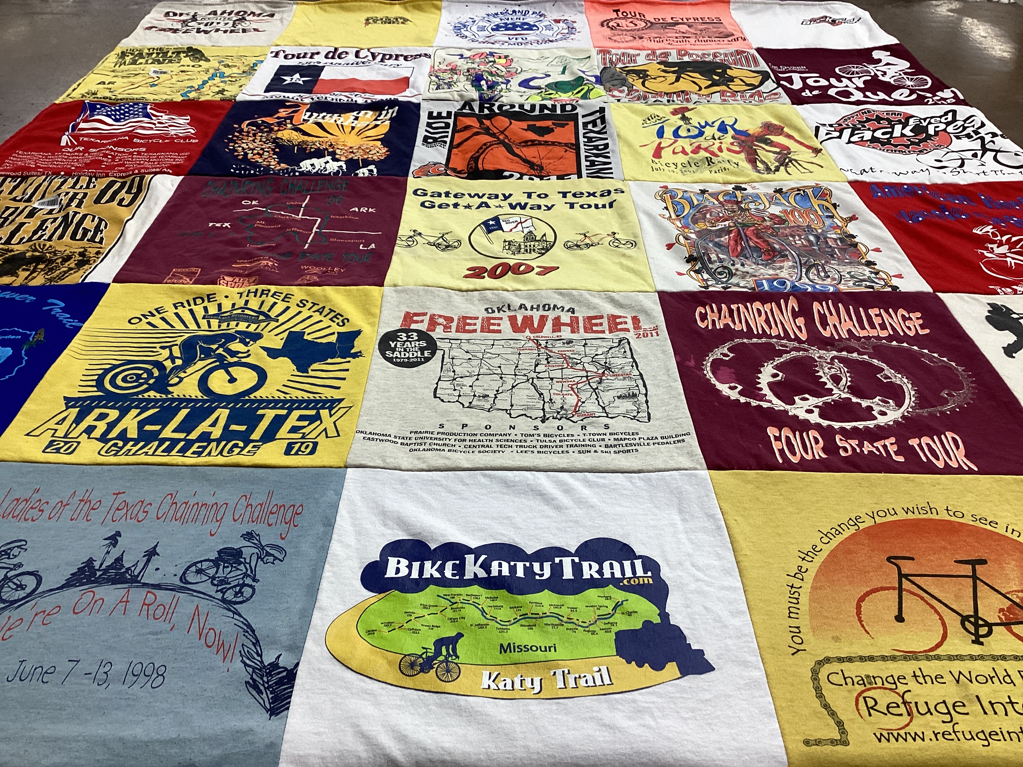 T-shirt quilt with cycling, biking themes by Nancy from AR