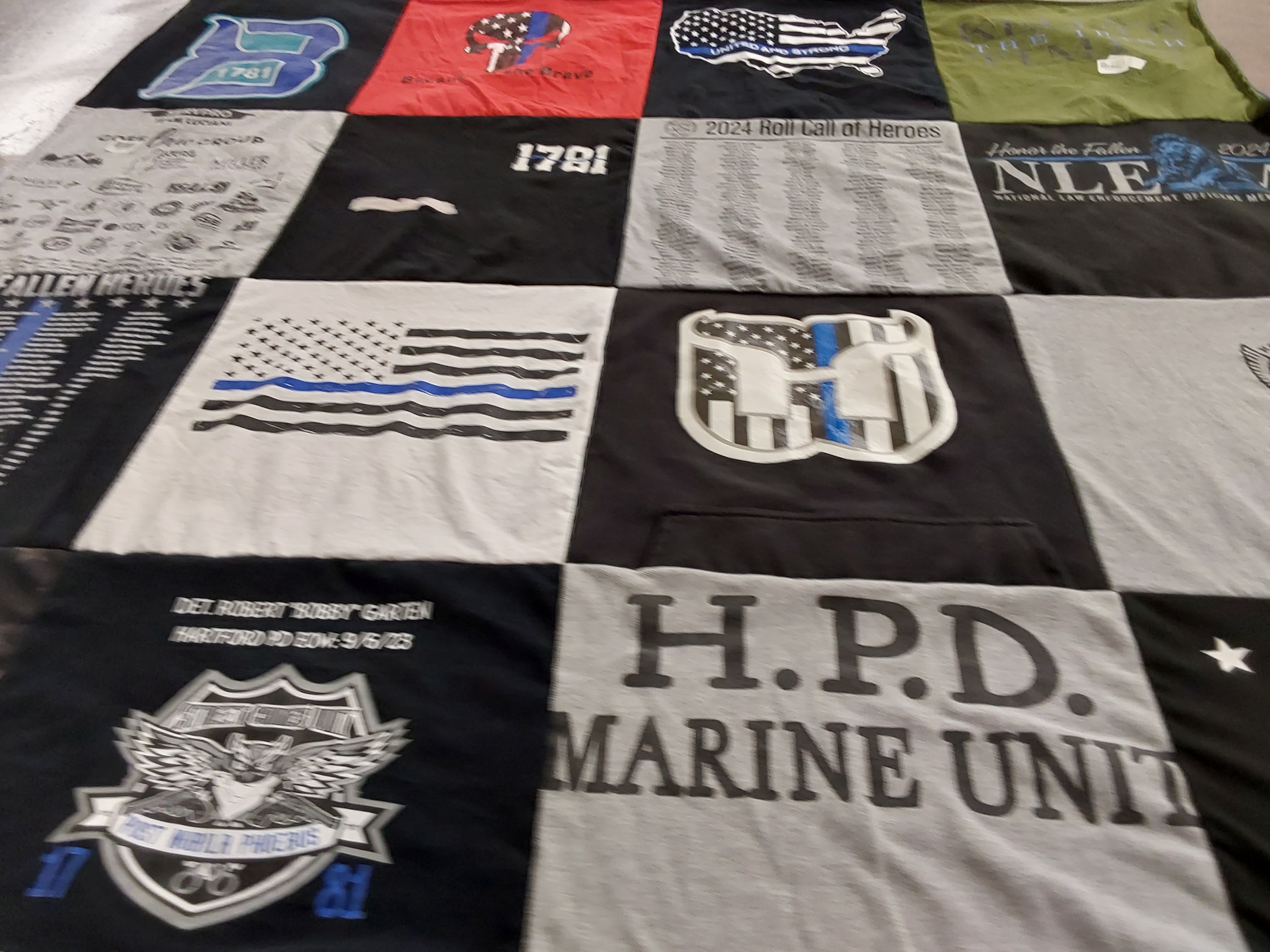 T-shirt quilt with law enforcement, patriotism themes by Kimber from CT