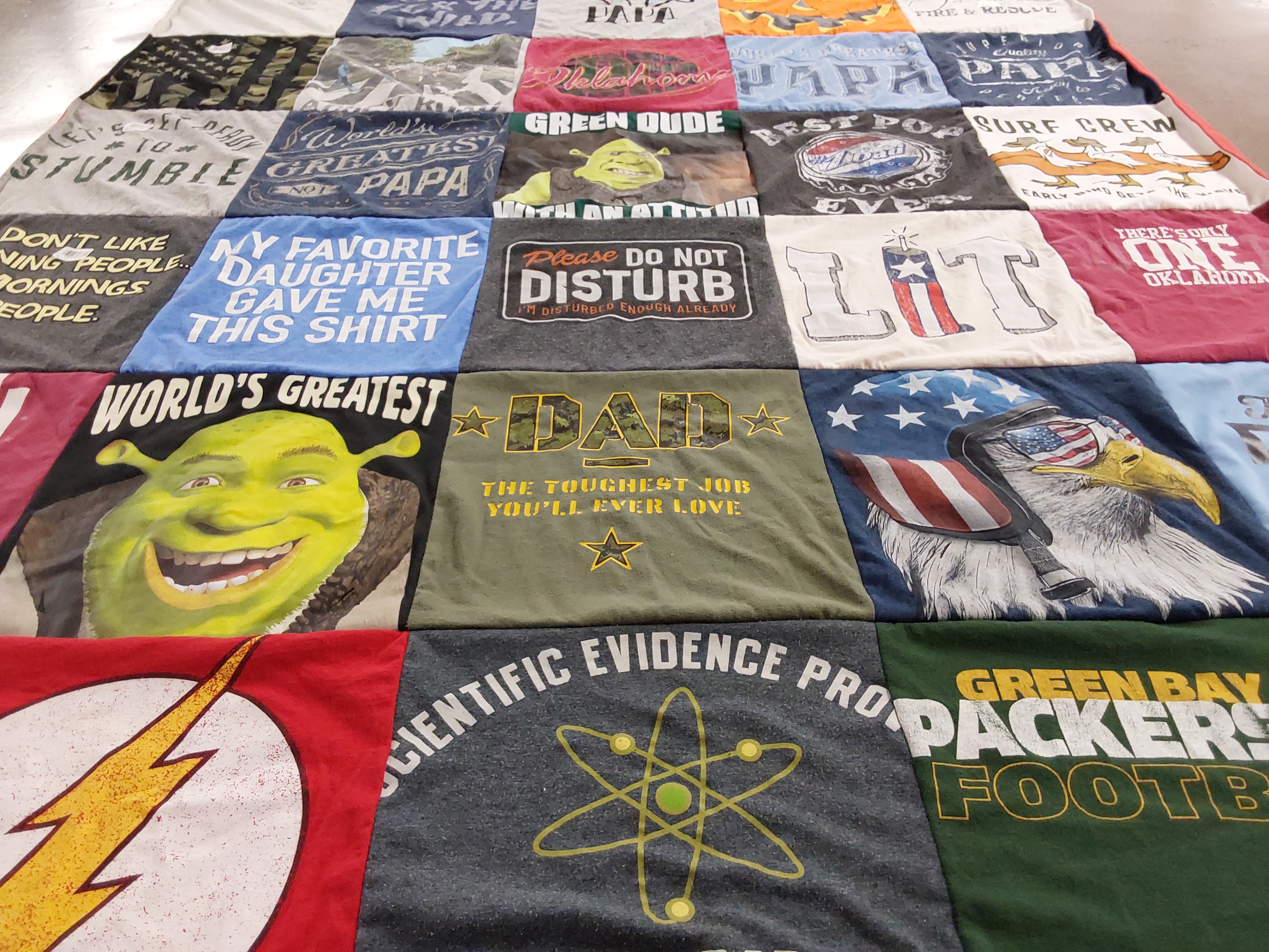T-shirt quilt with fatherhood, science themes by Stacia from VA