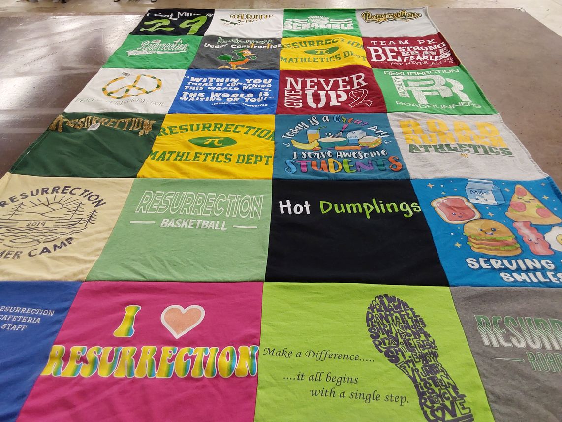 T-shirt quilt with sports, education themes by Nancy from IN