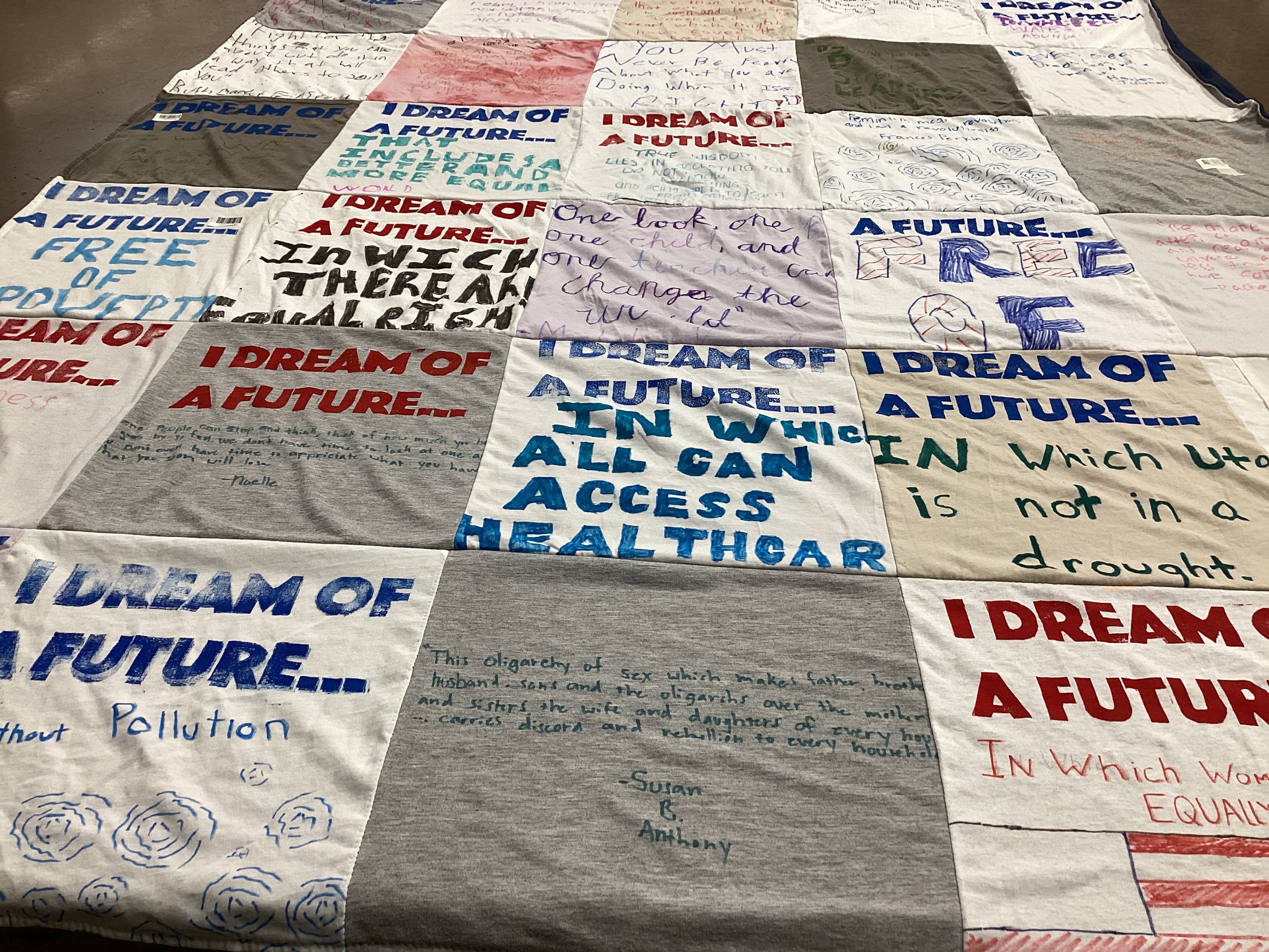 T-shirt quilt with social justice, environmental issues themes by Mario from UT