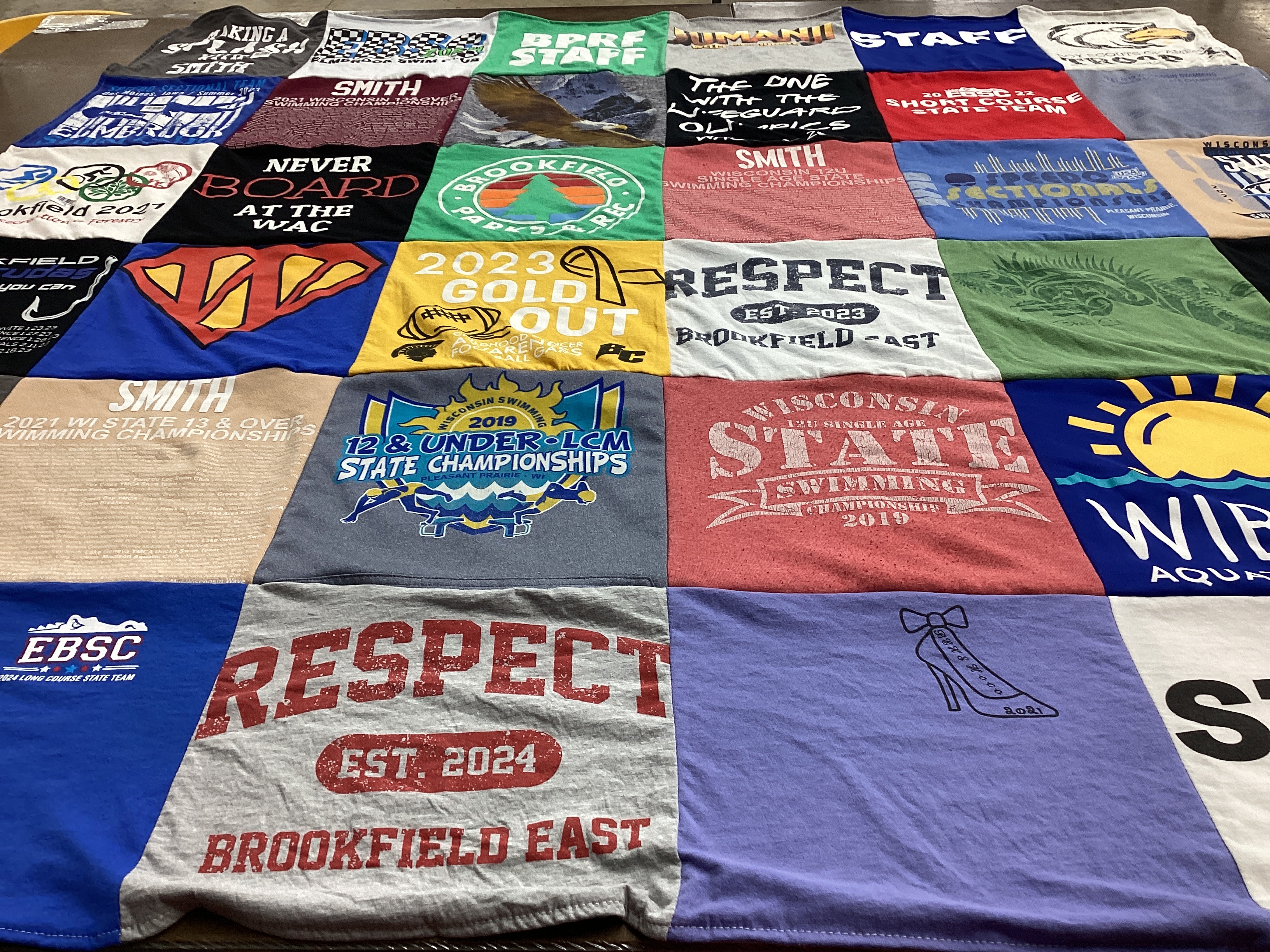 T-shirt quilt featuring brookfield east high school swim team by Shelly from WI