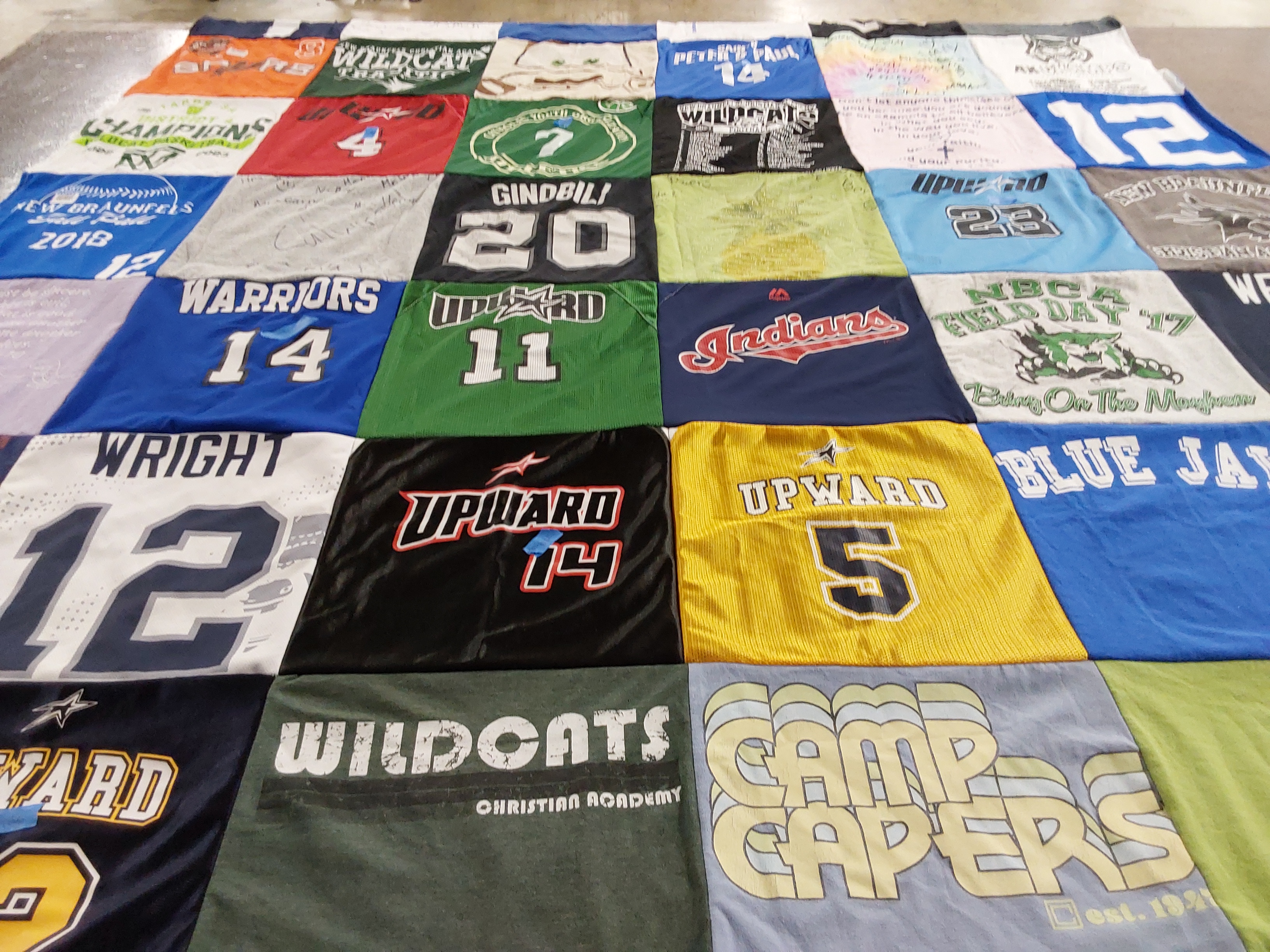 T-shirt quilt with sports, camps themes by Andrea from TX
