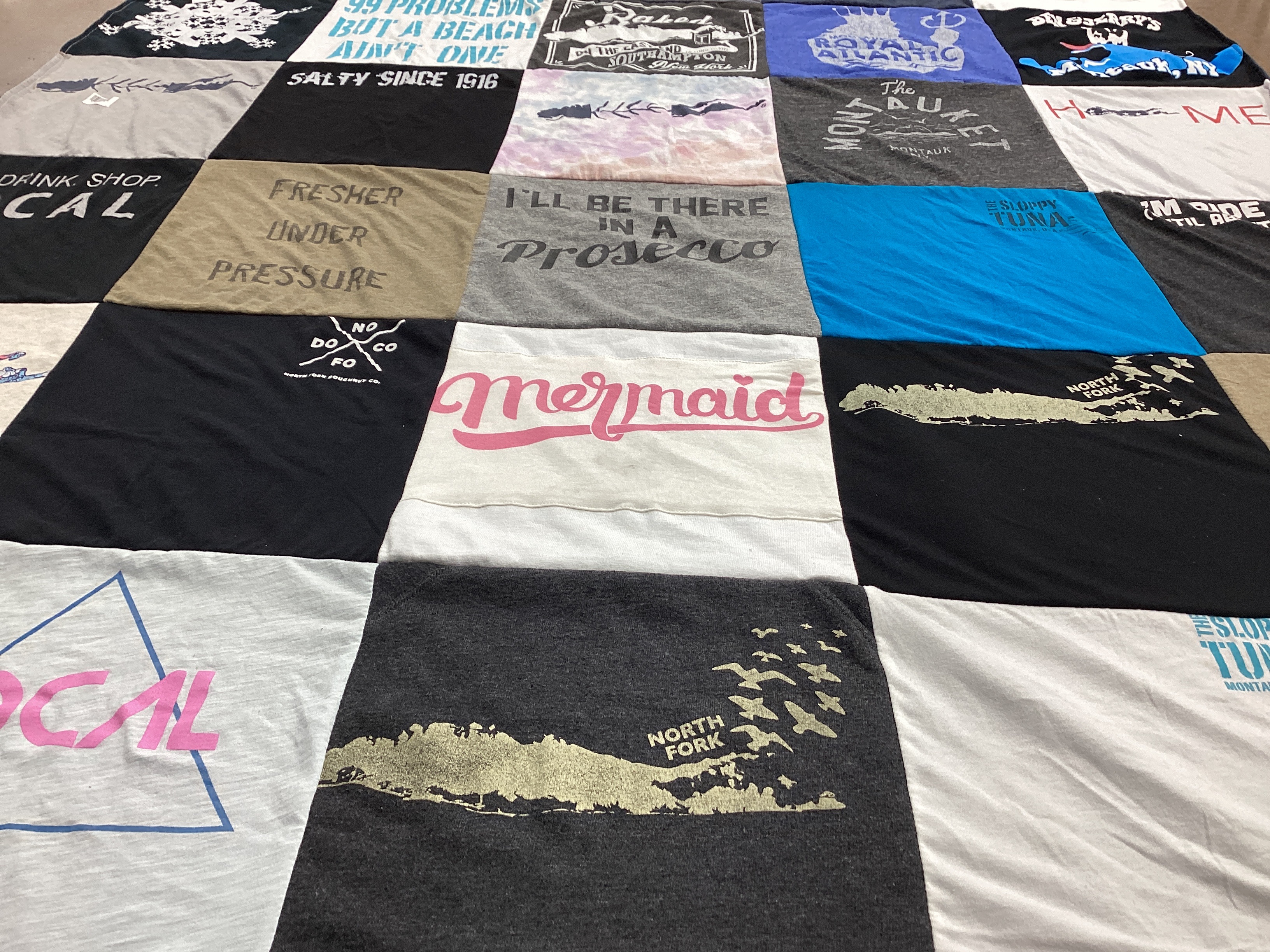 T-shirt quilt with beaches, seafood themes by Ashleigh from NY