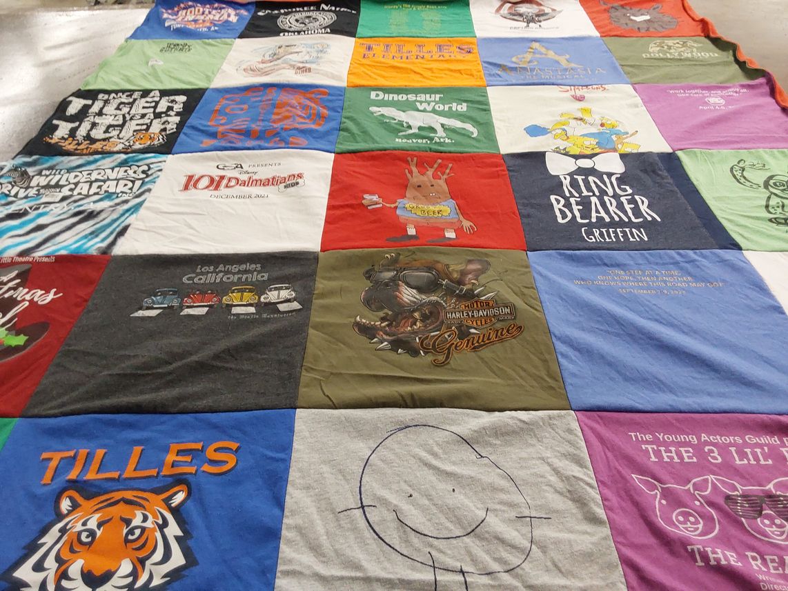 T-shirt quilt with theater, animals themes by Kate from AR