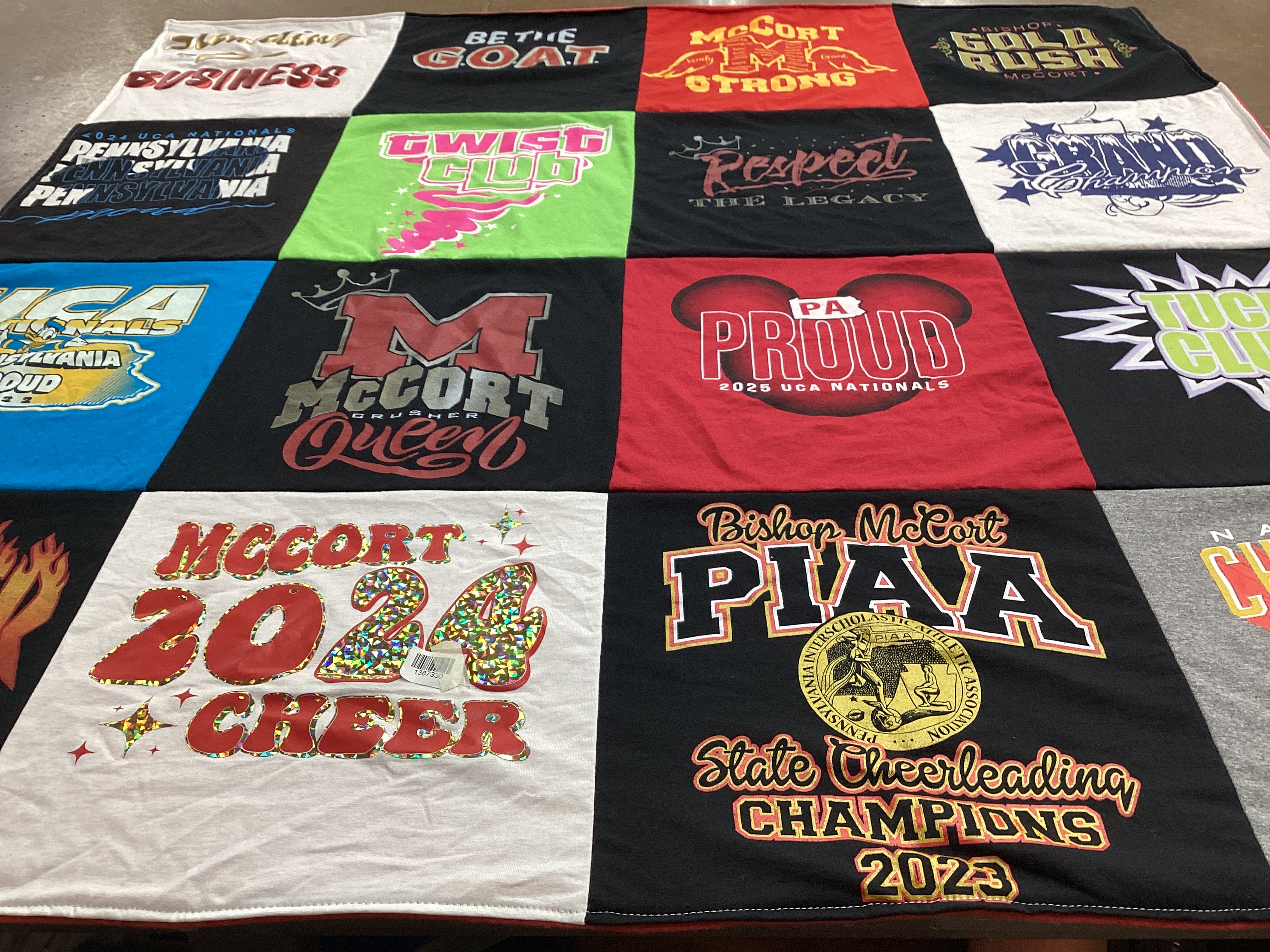 T-shirt quilt featuring mccort cheerleading by John from PA