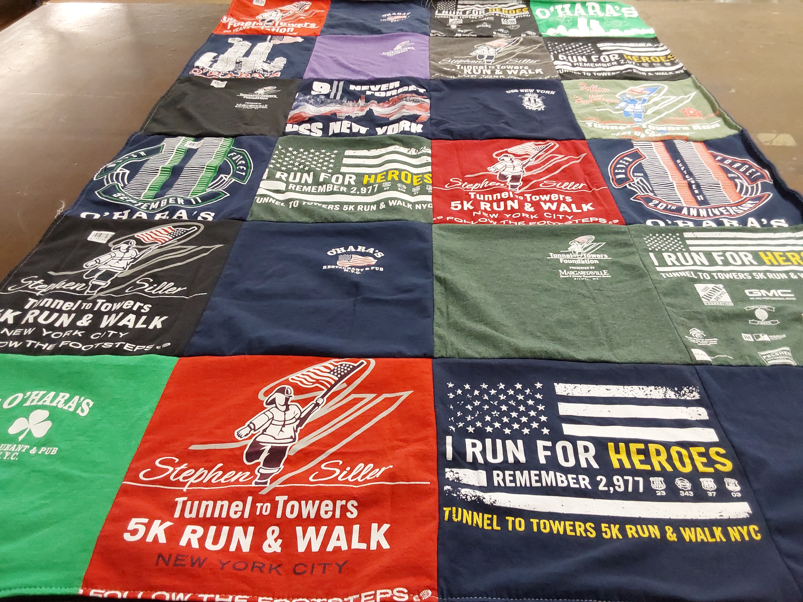 T-shirt quilt with running, community service themes by Lisa from NY