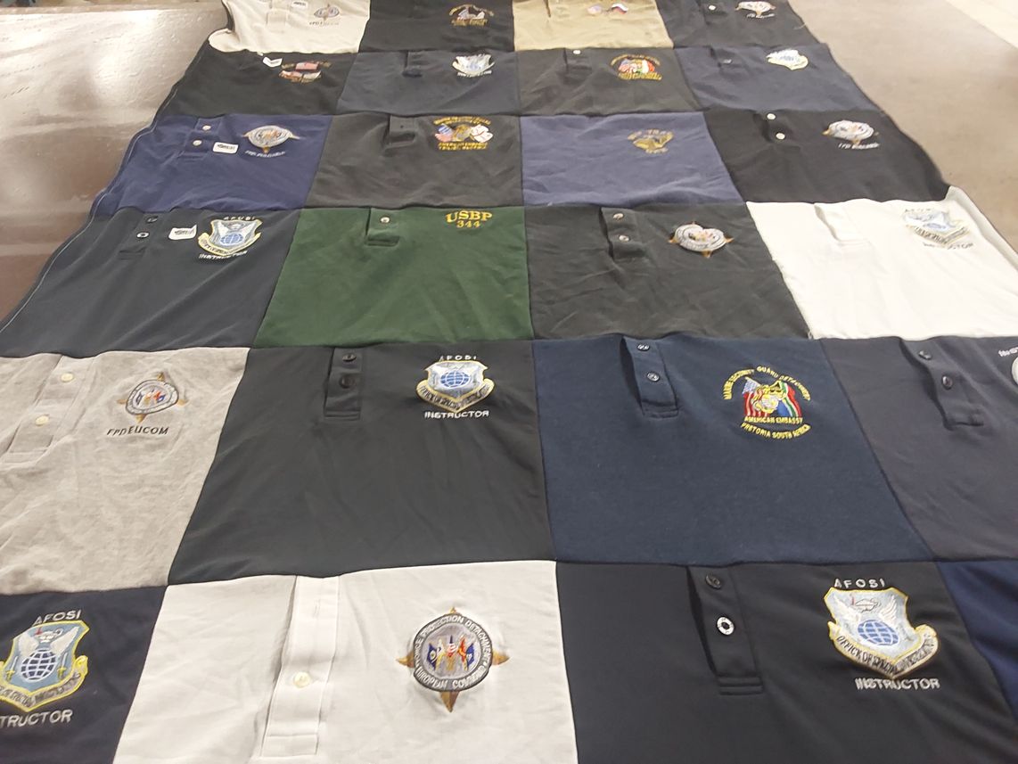 T-shirt quilt with law enforcement, instruction themes by Sydney from GA