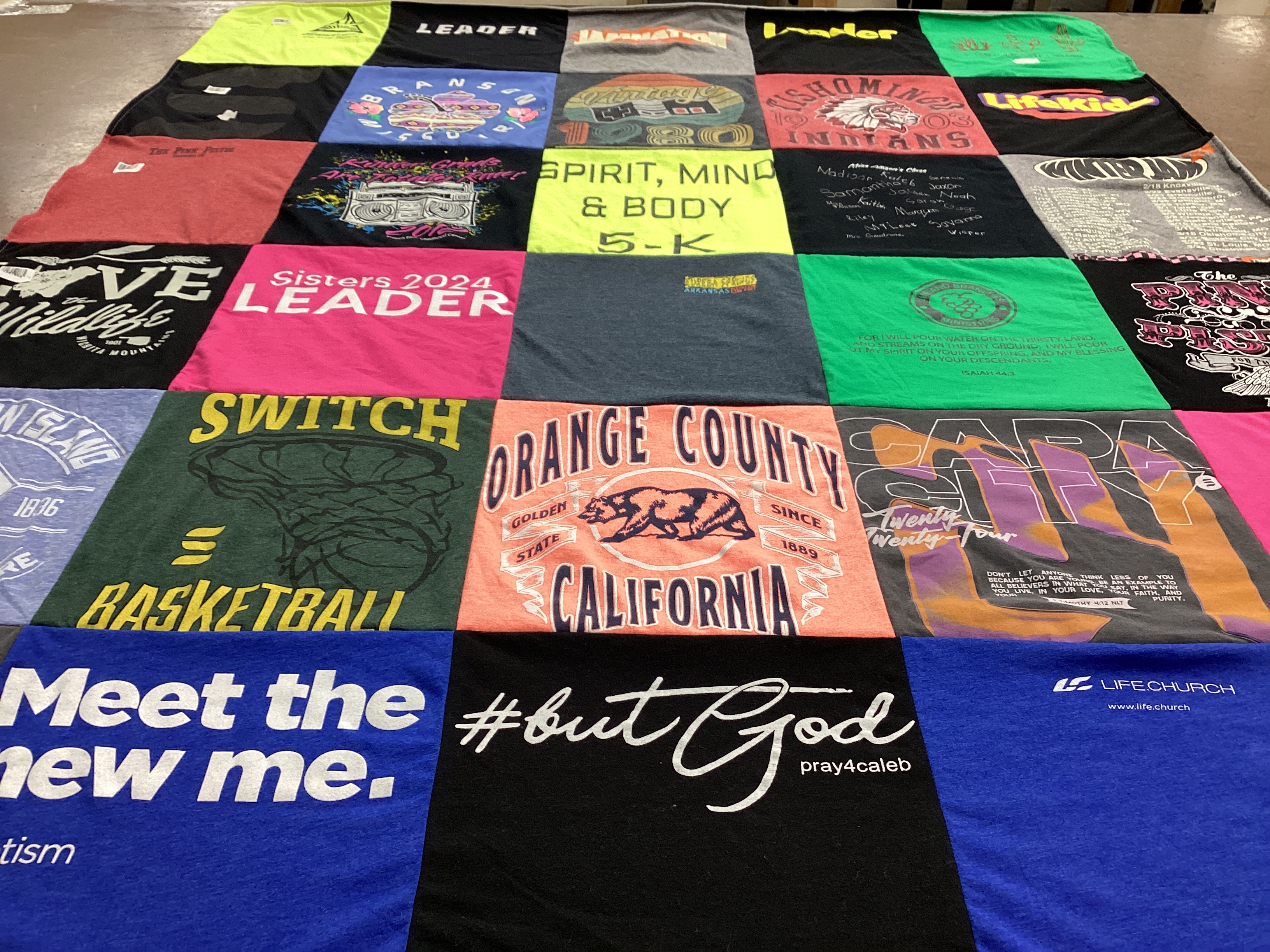 T-shirt quilt with sports, community themes by Crystal from OK