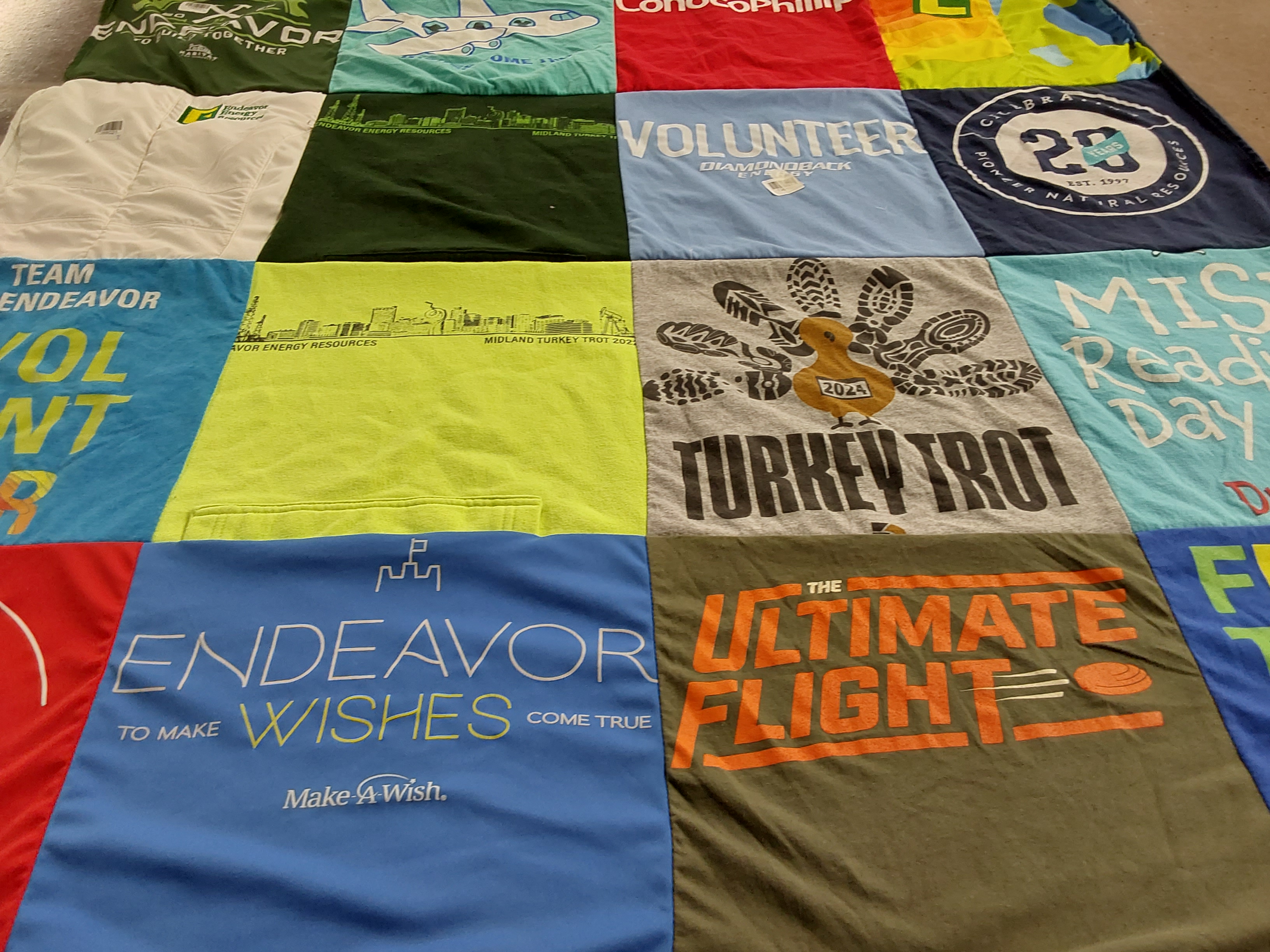 T-shirt quilt with community service, charity events themes by Jessica from TX