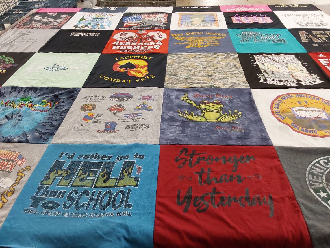 T-shirt quilt with military, educational themes by Kristine from NE