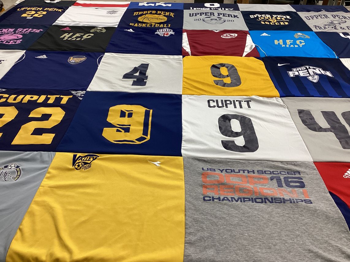 T-shirt quilt featuring upper perk high school, eastern pen high school by Erin from PA