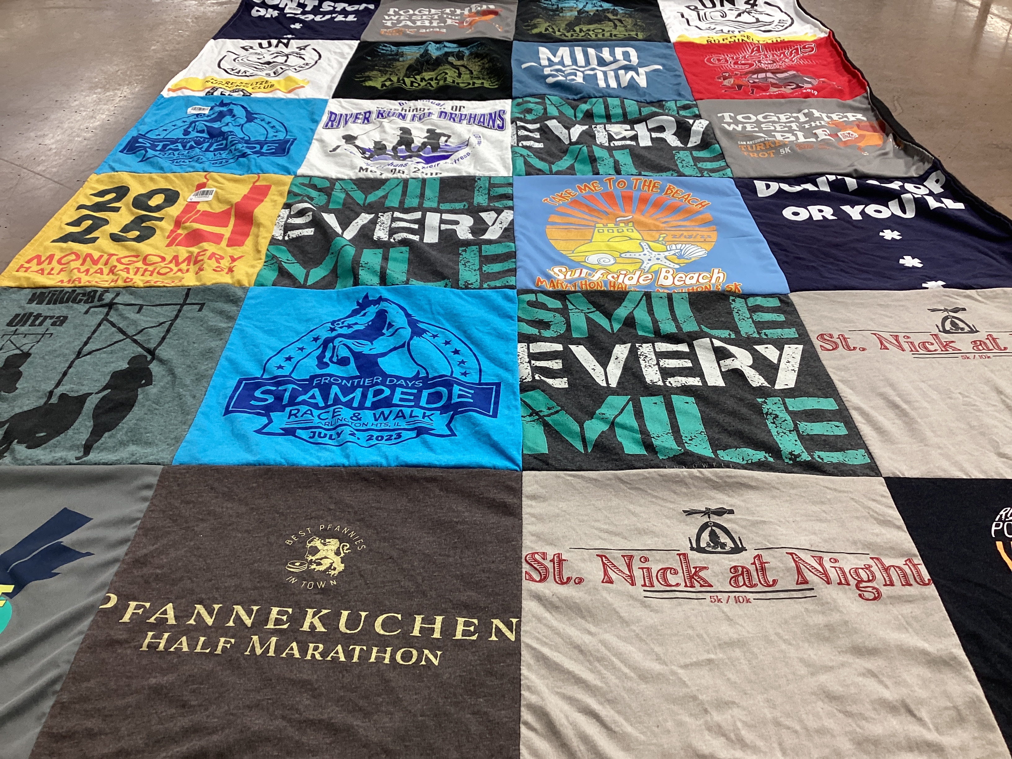 T-shirt quilt with running, marathons themes by Melody from WY