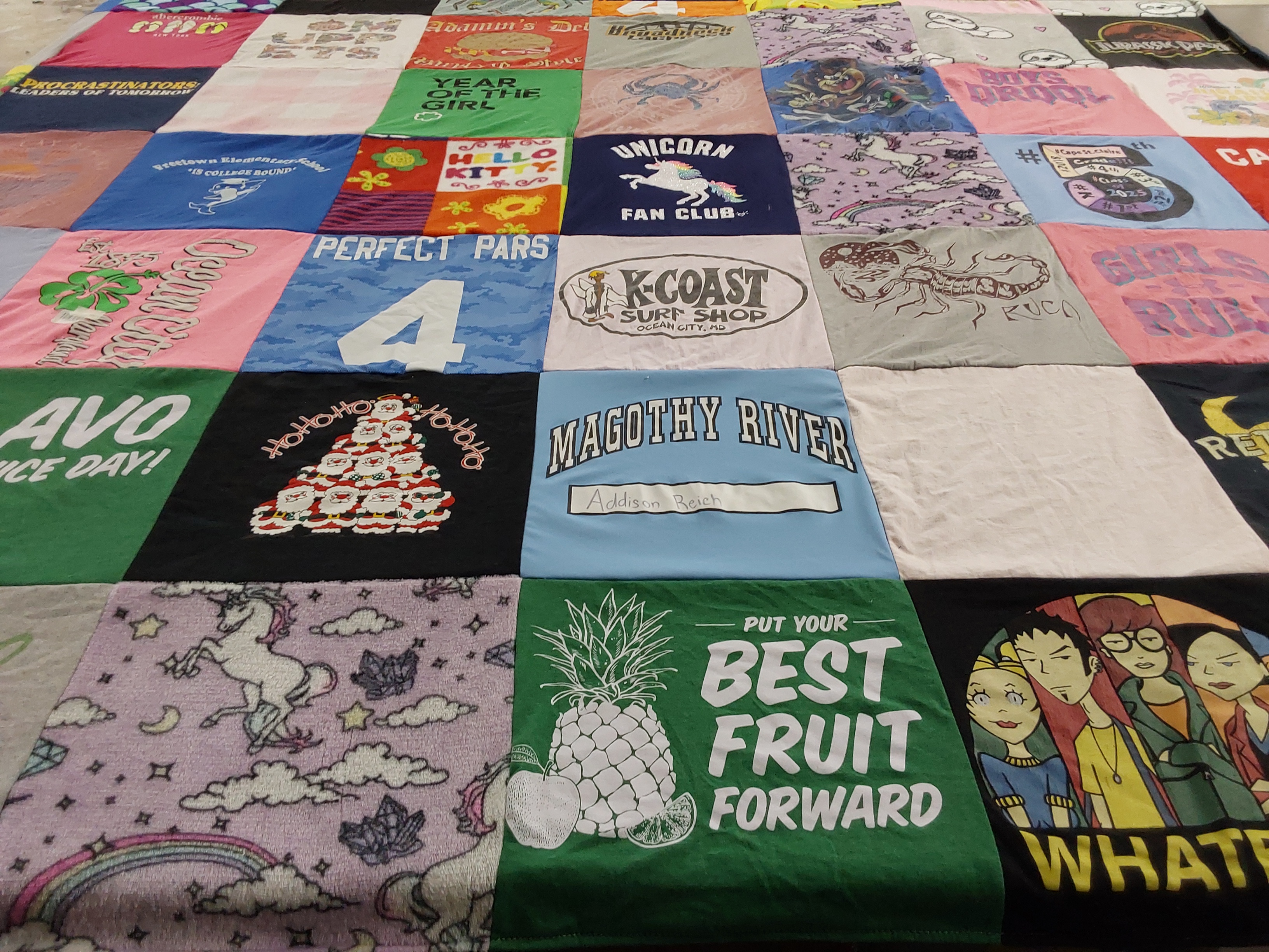 T-shirt quilt with surfing, unicorns themes by Ben from FL