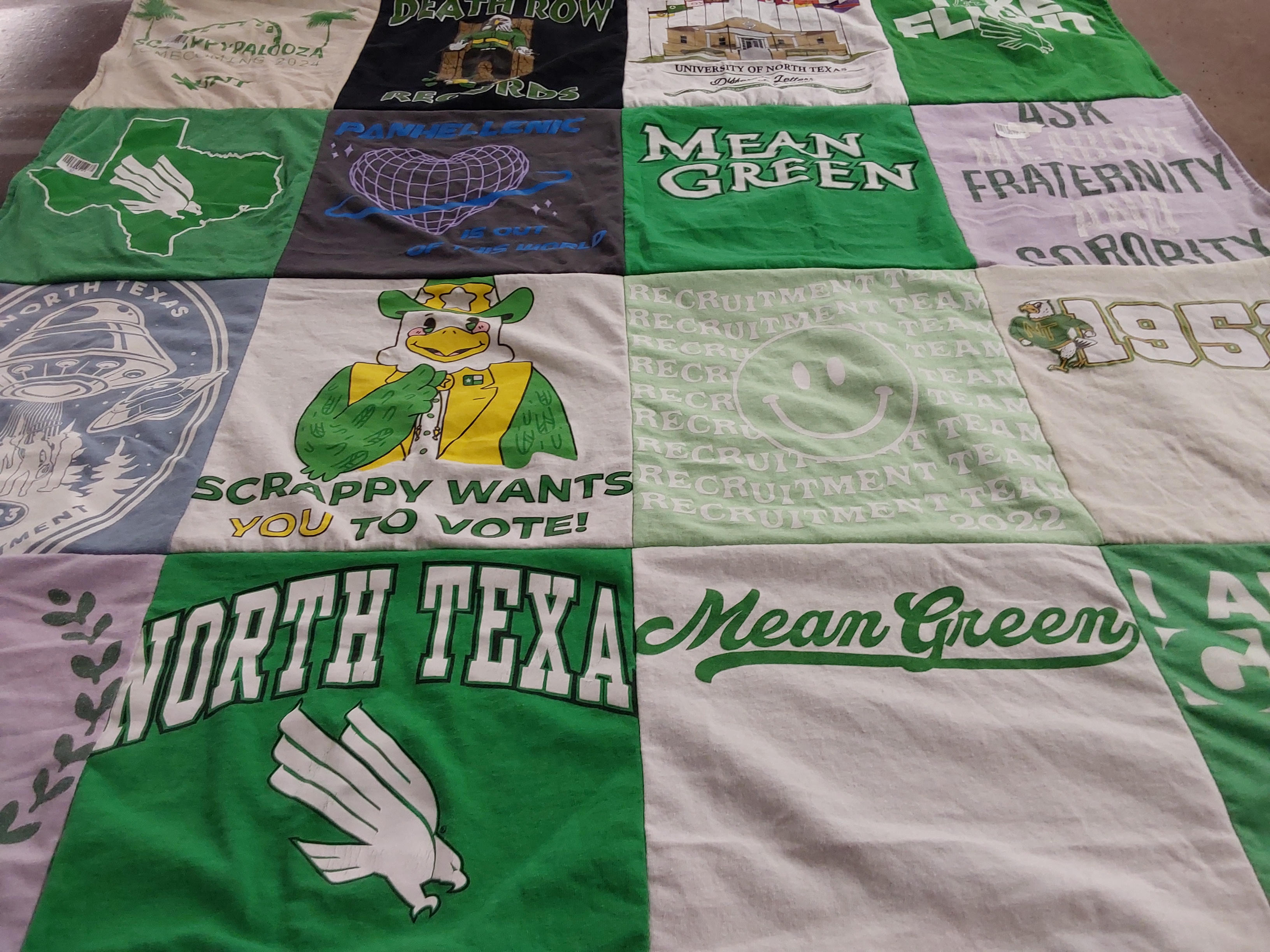 T-shirt quilt featuring mean green by Ronald from TX