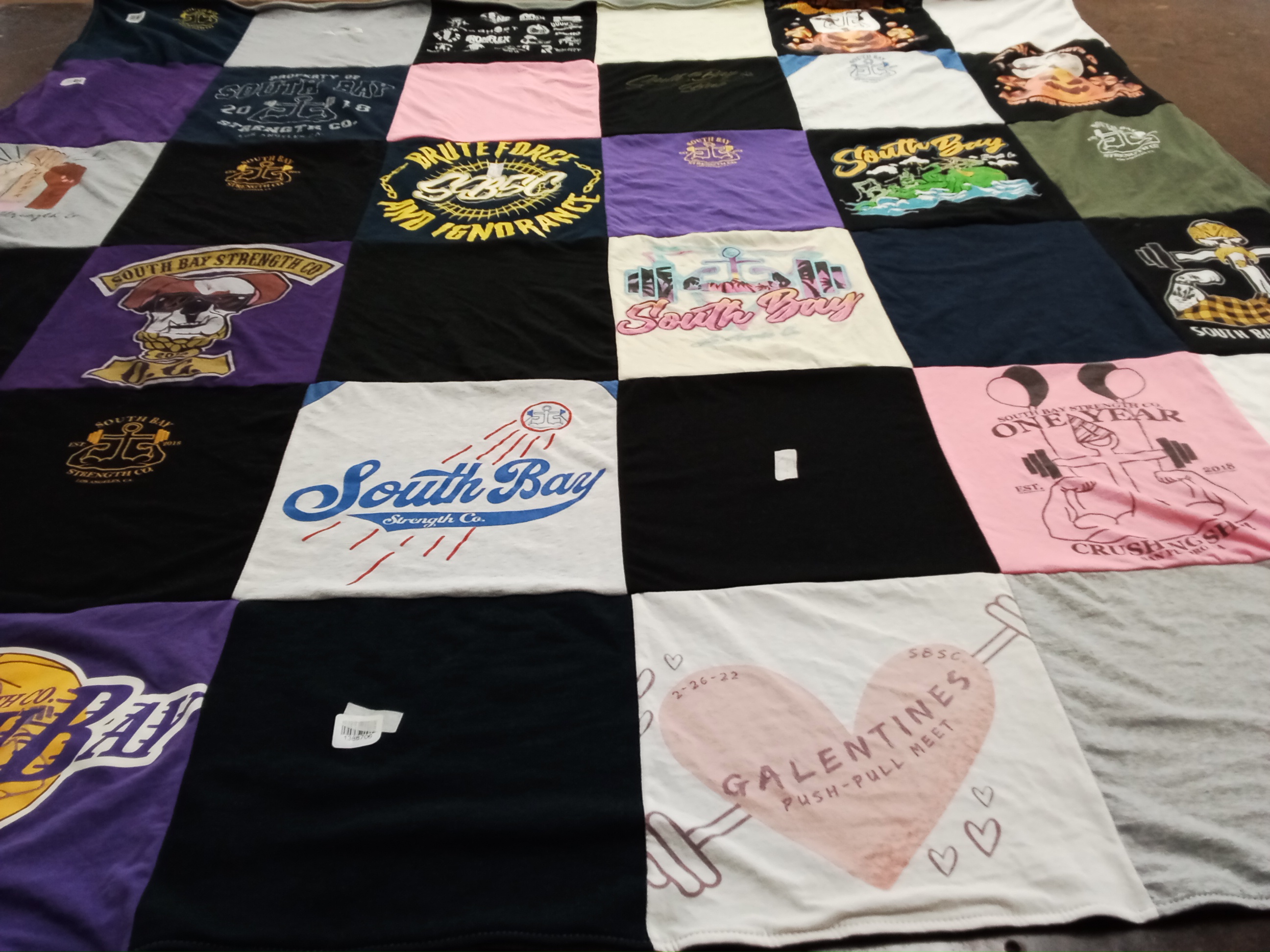 T-shirt quilt with fitness, strength training themes by Ashley from NV