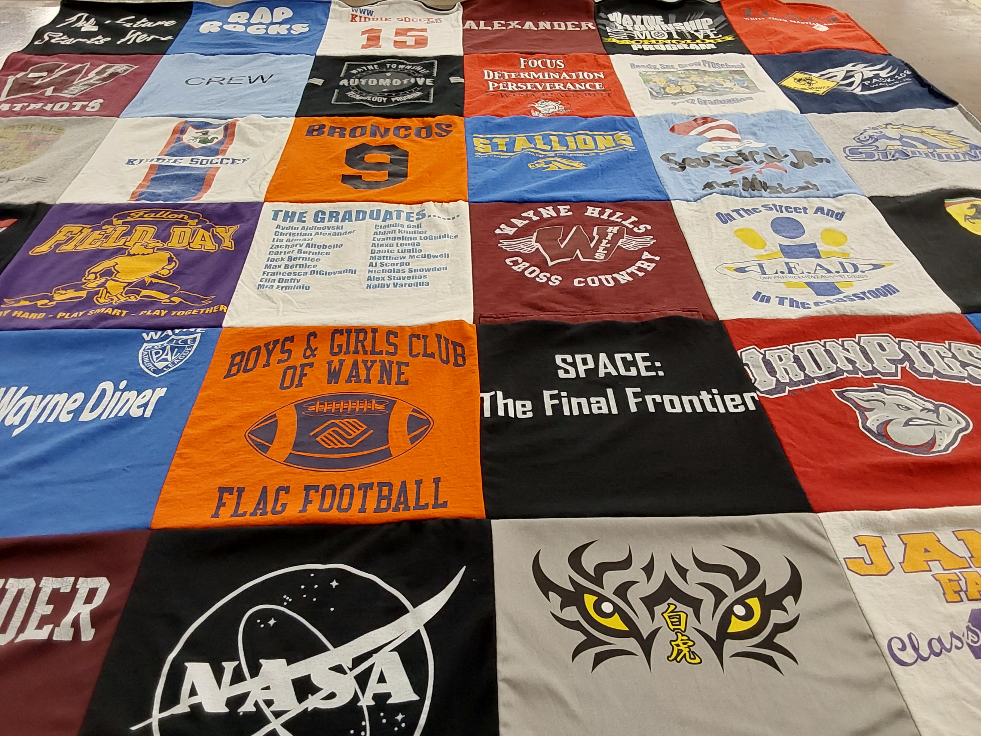 T-shirt quilt featuring broncos, stallions by Karen from NJ