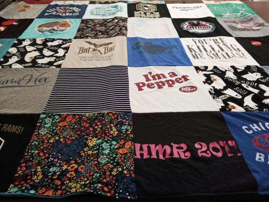 T-shirt quilt with hiking, drinks themes by Maddison from IA