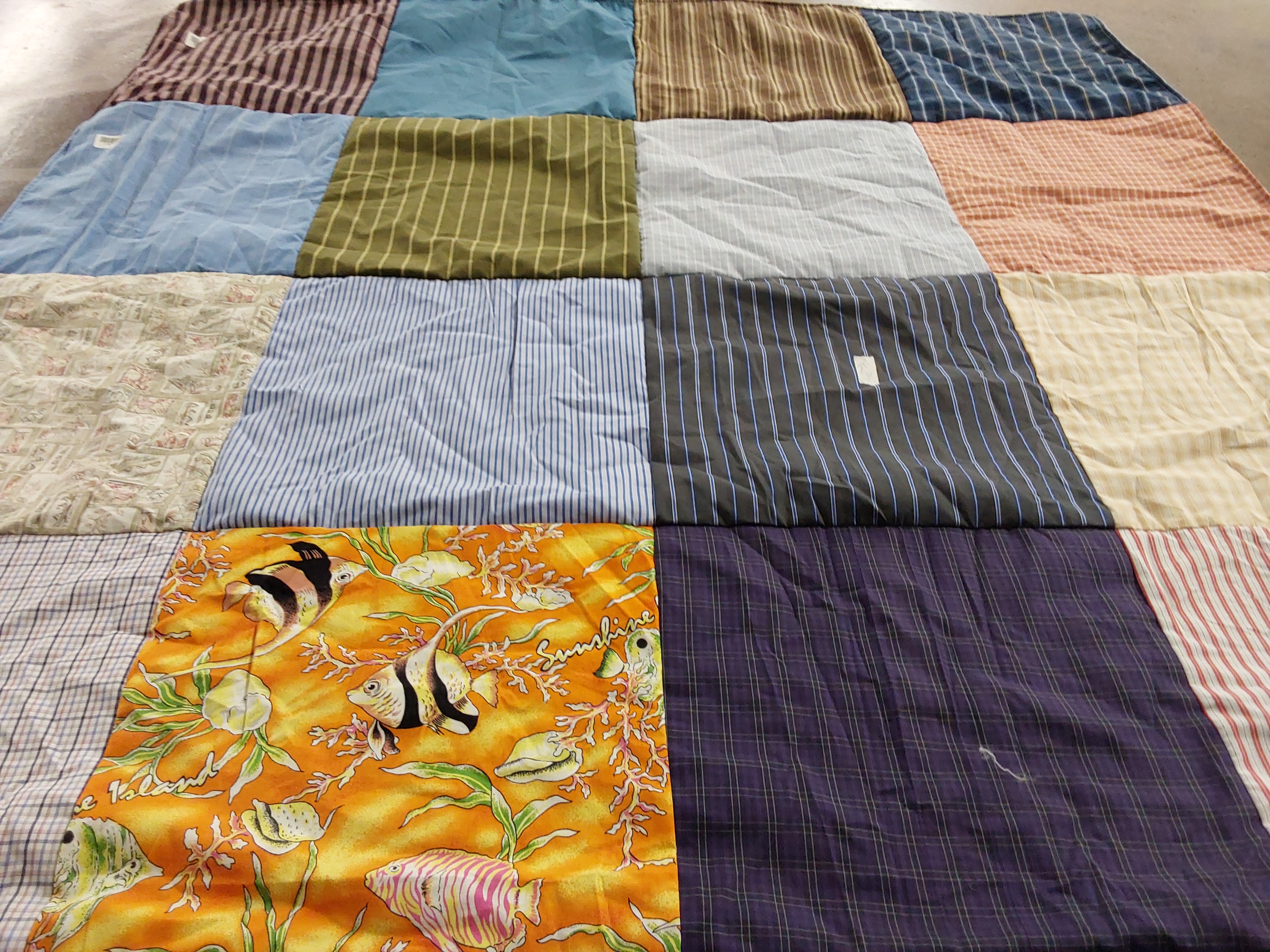 T-shirt quilt with marine life, fishing themes by Edith from CA