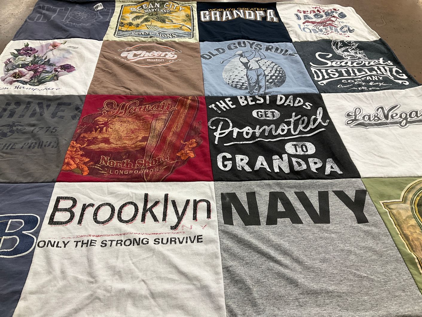 T-shirt quilt with family, travel themes by Kathi from VA