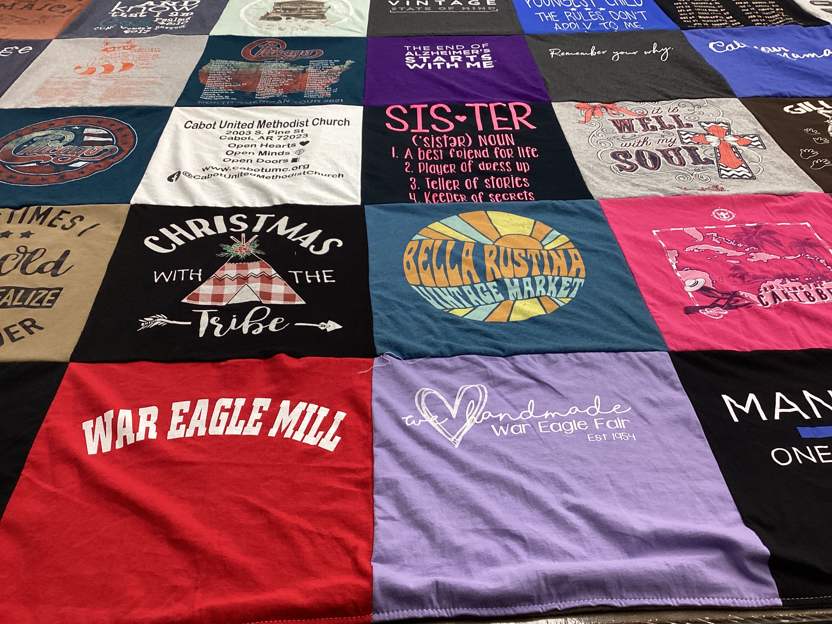 T-shirt quilt with community, spirituality themes by Nancy from AR