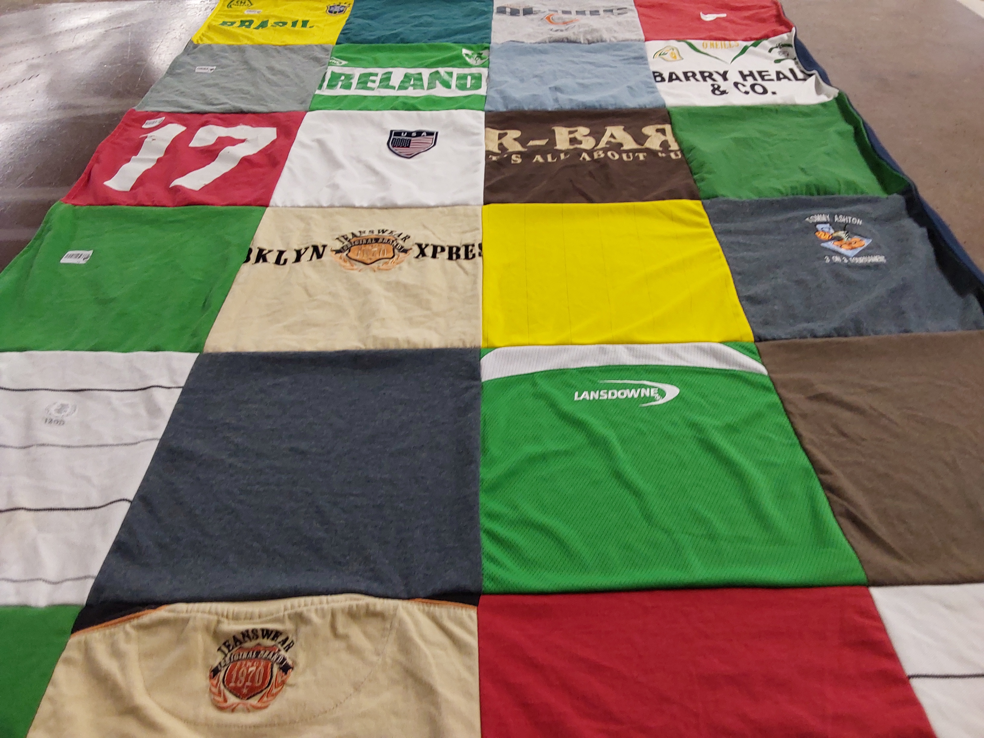 T-shirt quilt with sports, travel themes by Yvonne from FL