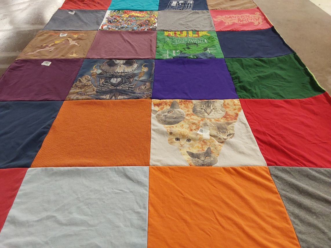 T-shirt quilt with comics, movies themes by Shannon from TN