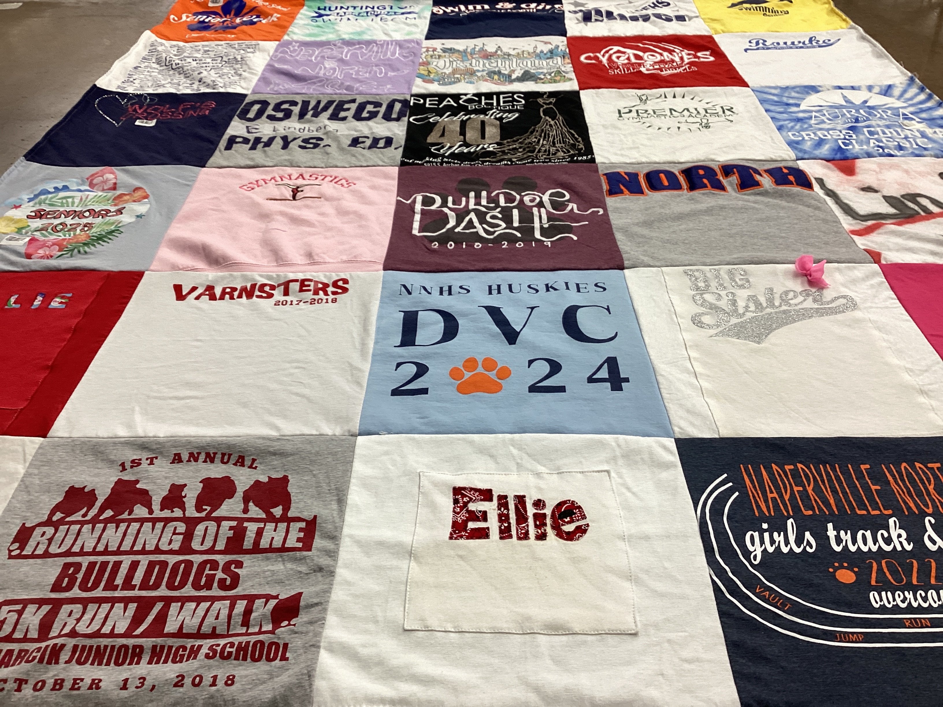 T-shirt quilt featuring nnhs huskies, bulls by Marnie from IL