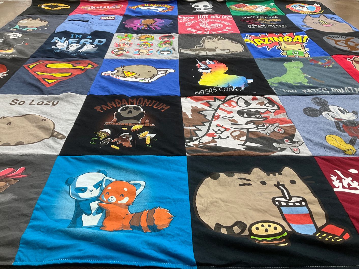 T-shirt quilt with pop culture, cartoons themes by Alicia from CA