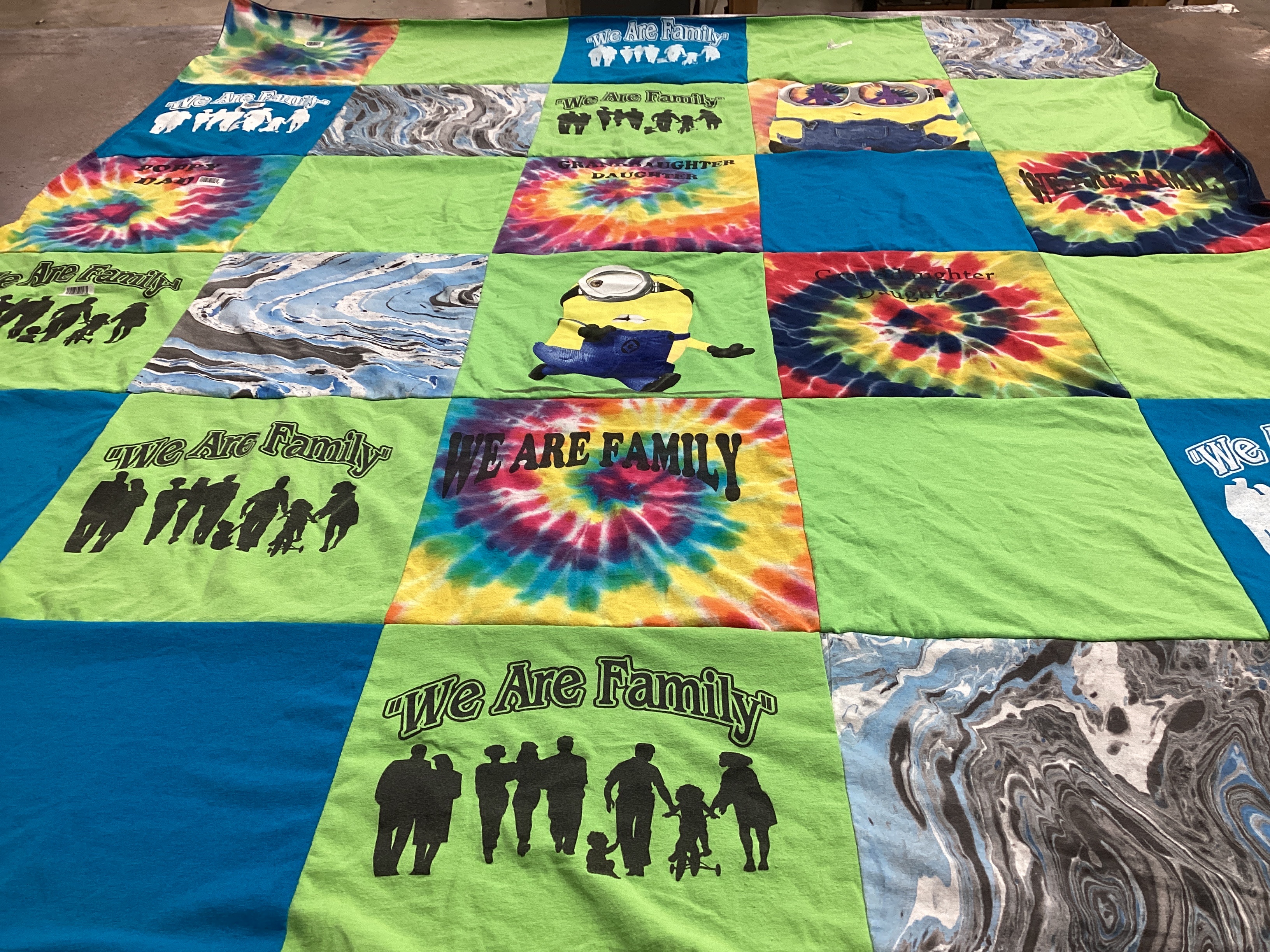 T-shirt quilt with family, art themes by Joan from FL