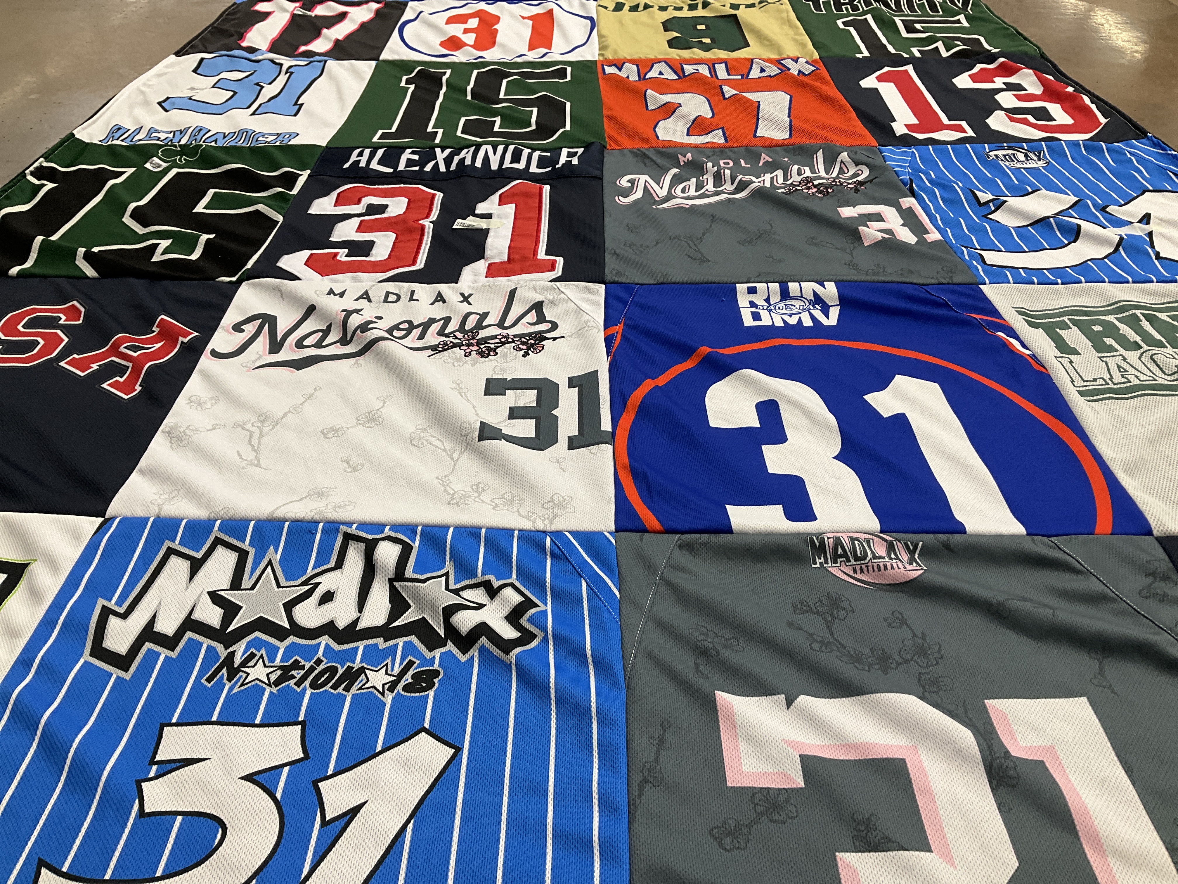 T-shirt quilt with sports, lacrosse themes by Katie from KY