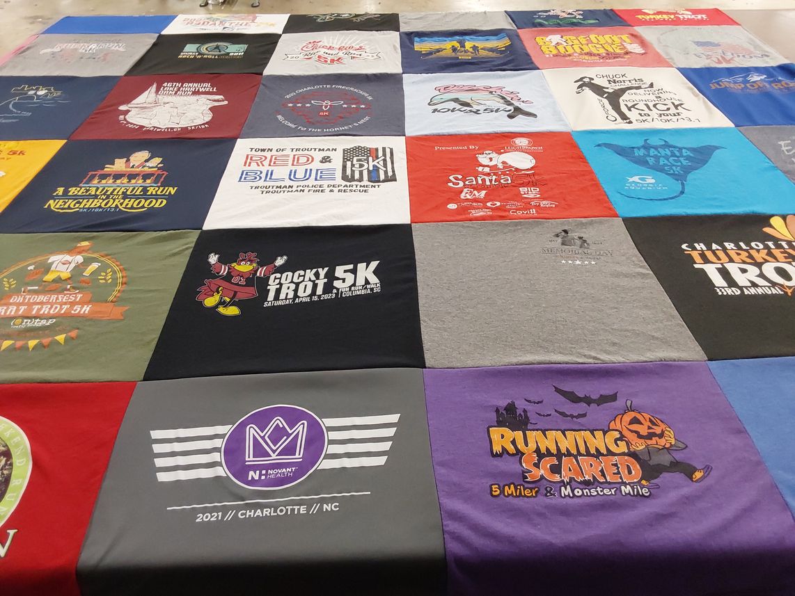 T-shirt quilt with running, community events themes by Christine from SC