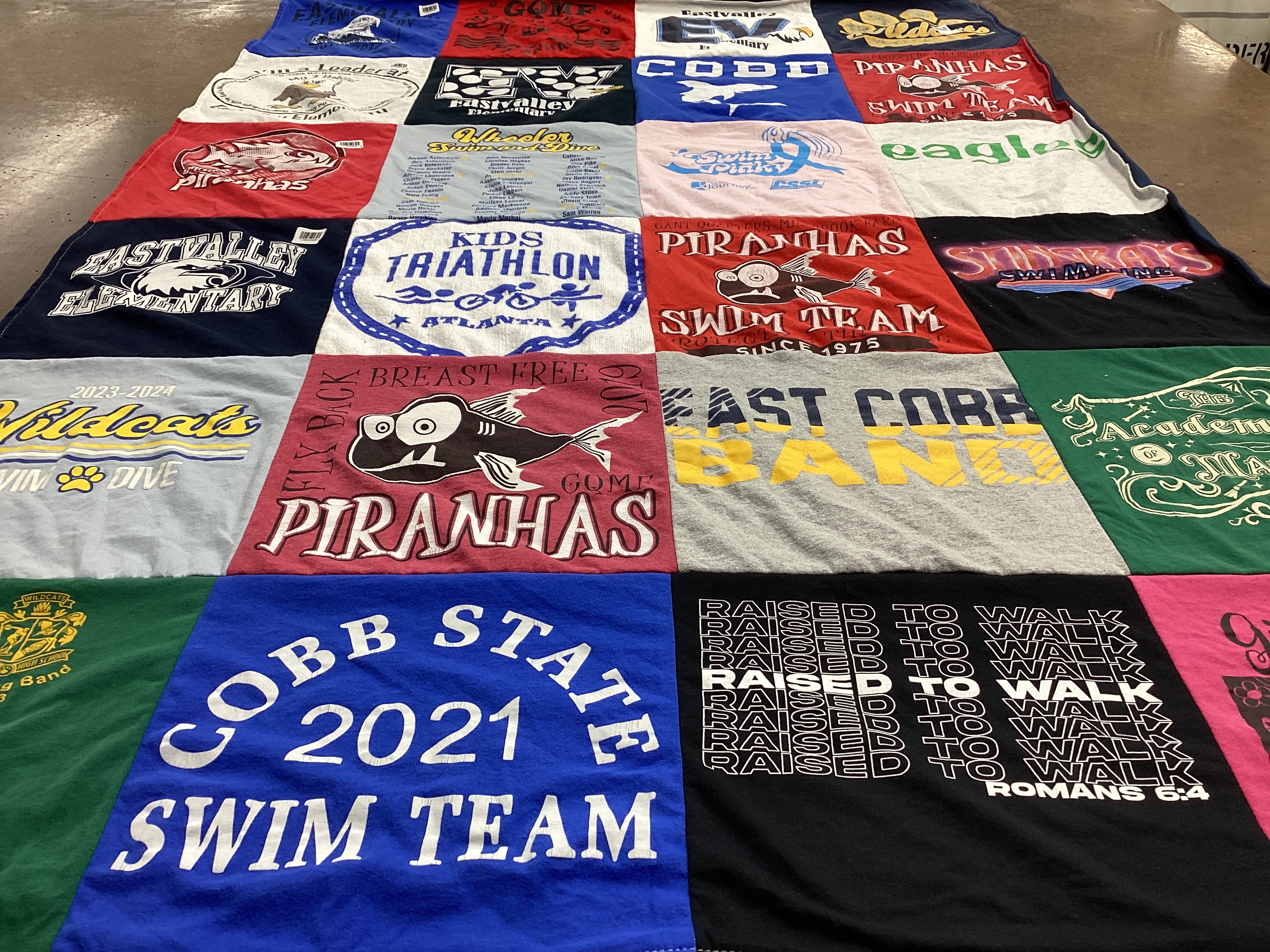 T-shirt quilt featuring piranhas swim team, wildcats swim dive team by Elisabeth from GA