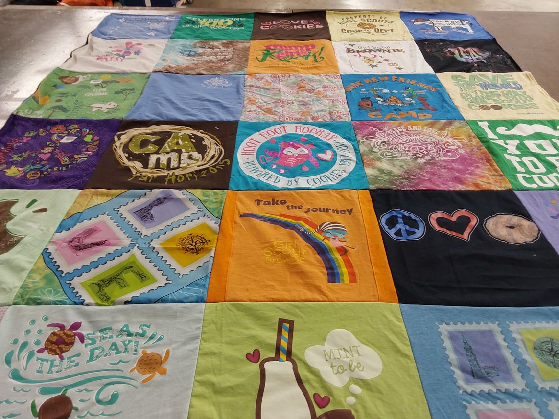 T-shirt quilt with cooking, camping themes by Katie from IL
