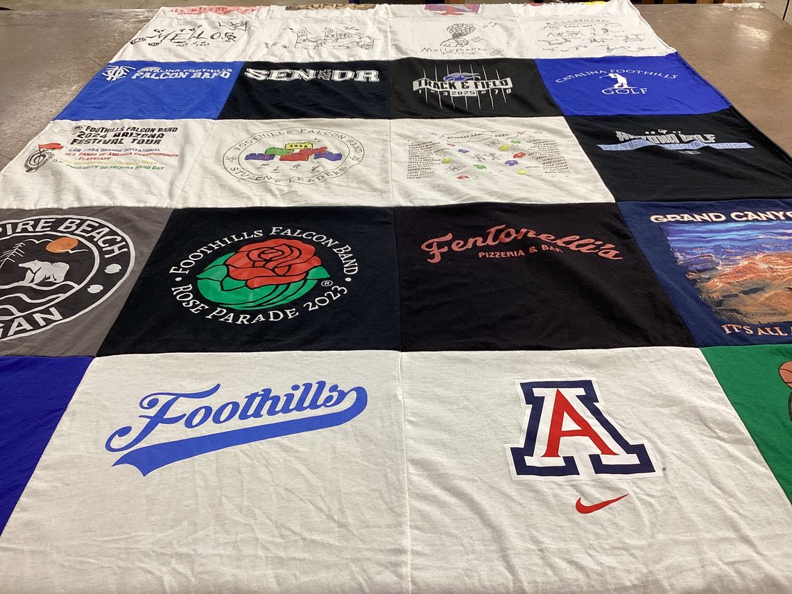 T-shirt quilt featuring foothills falcon band by MARY from AZ