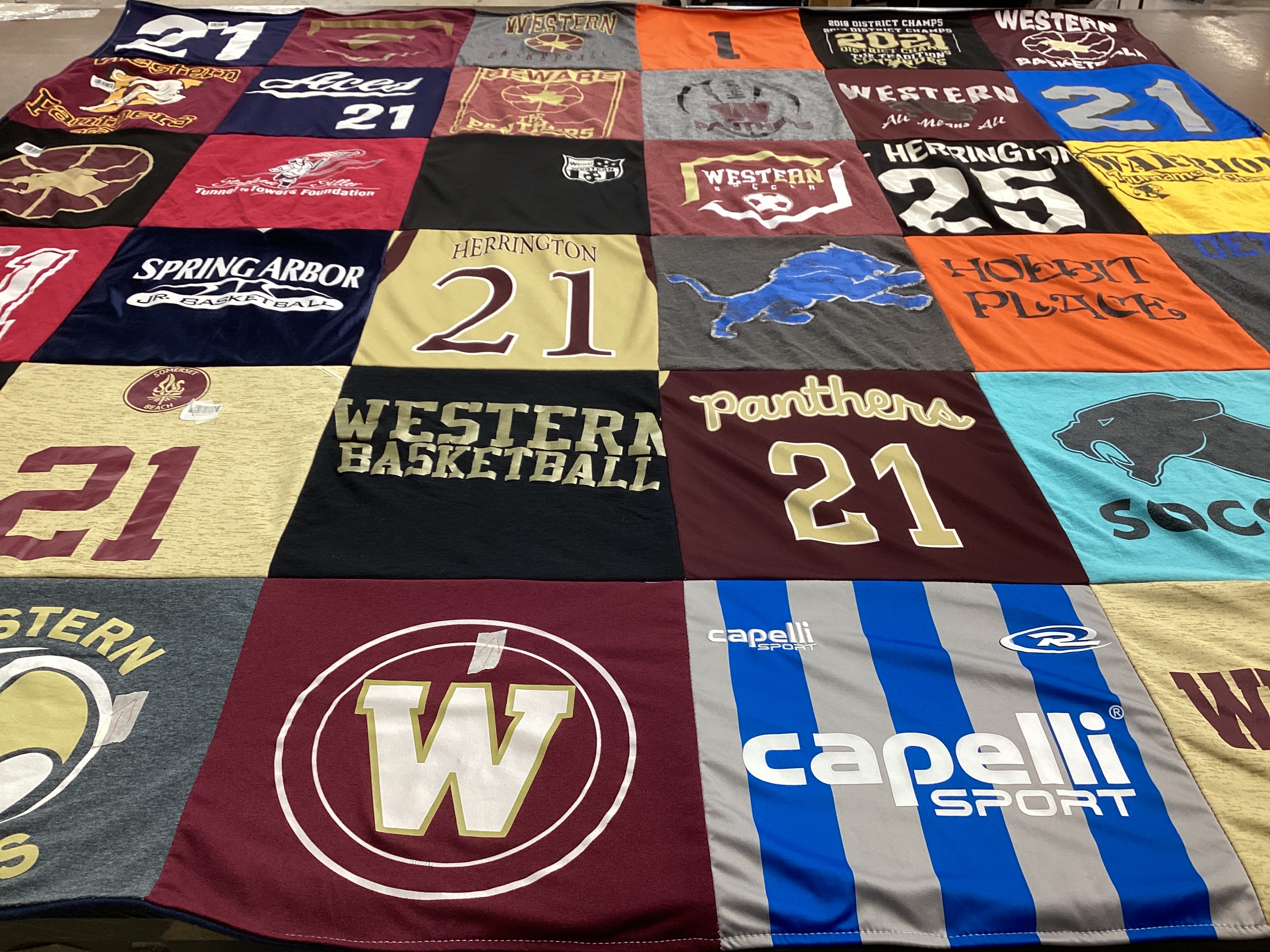 T-shirt quilt featuring western basketball team, panthers team by Erin from MI
