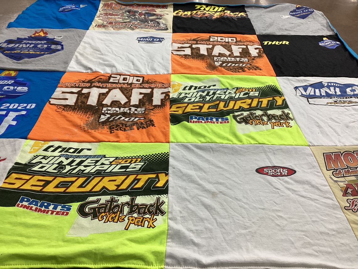 T-shirt quilt with motorsports, cycling themes by Stacey from FL