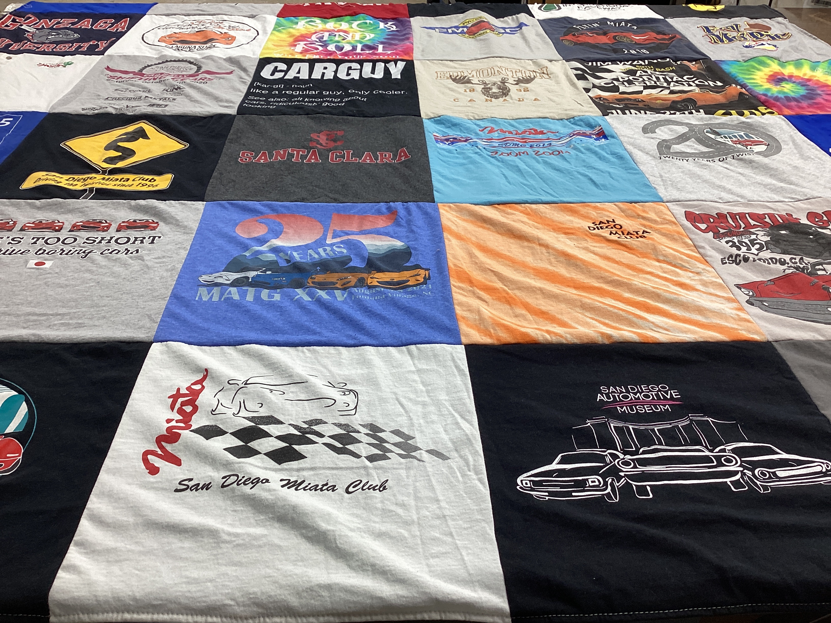 T-shirt quilt with cars, automotive themes by Laurie from CA